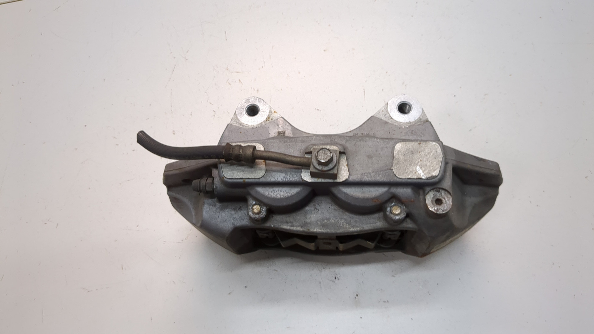 Суппорт передний левый