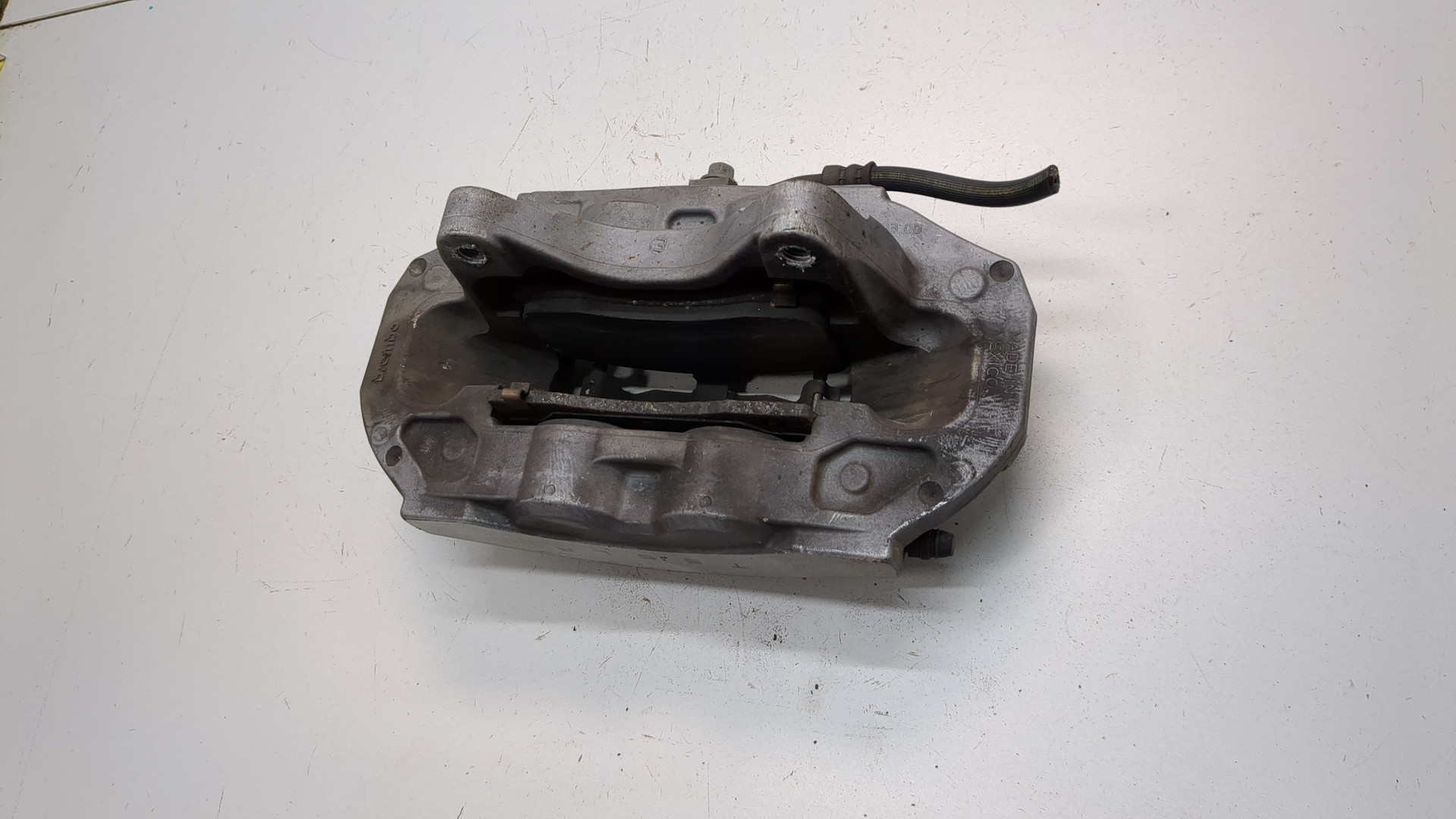 Суппорт передний левый