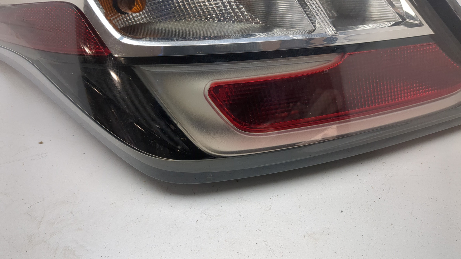 Фонарь задний левый