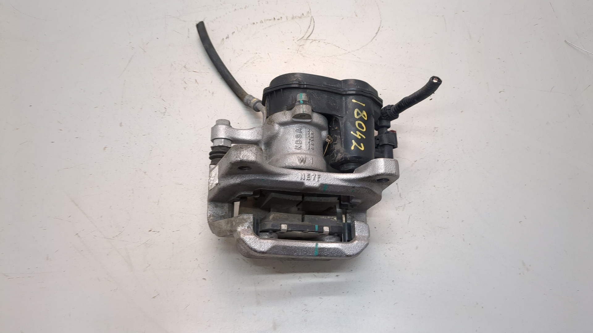 Суппорт задний левый