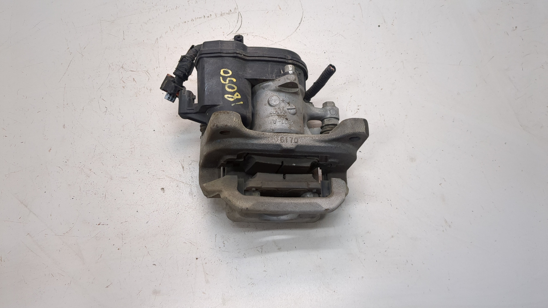 Суппорт задний левый