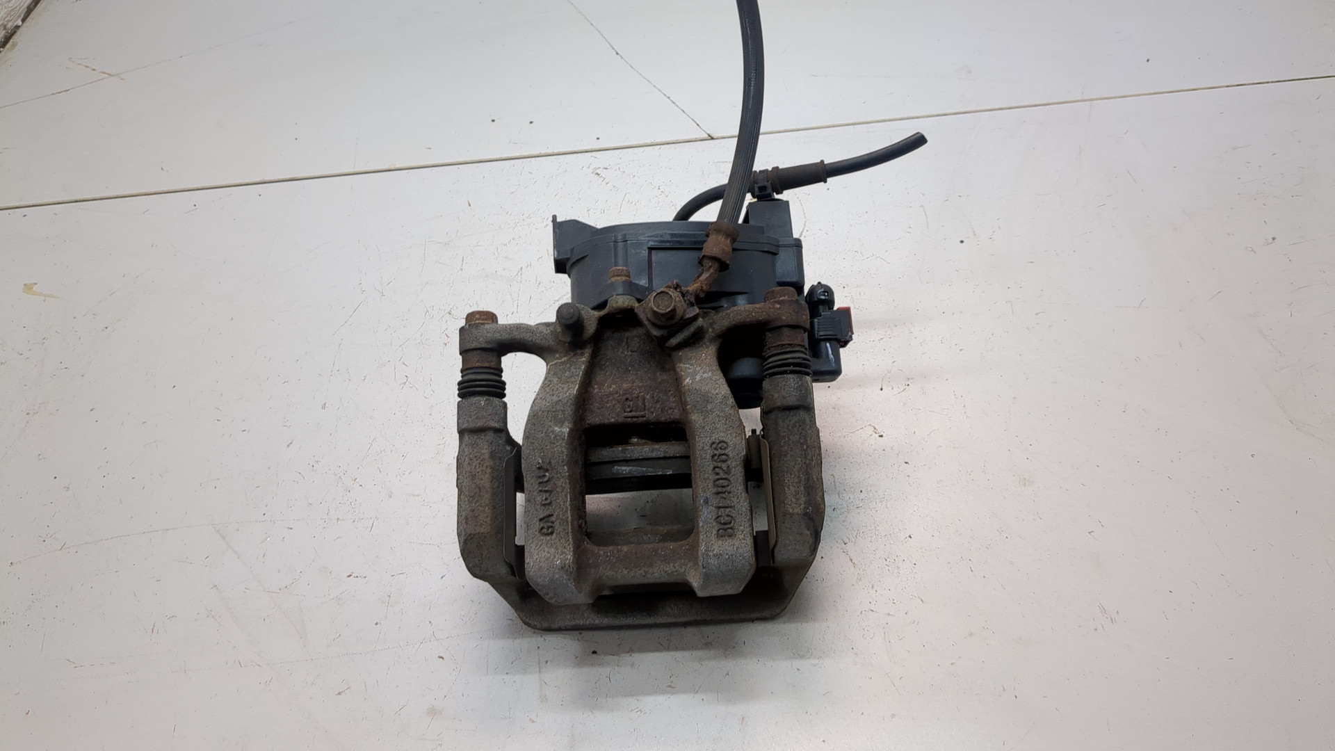 Суппорт задний левый