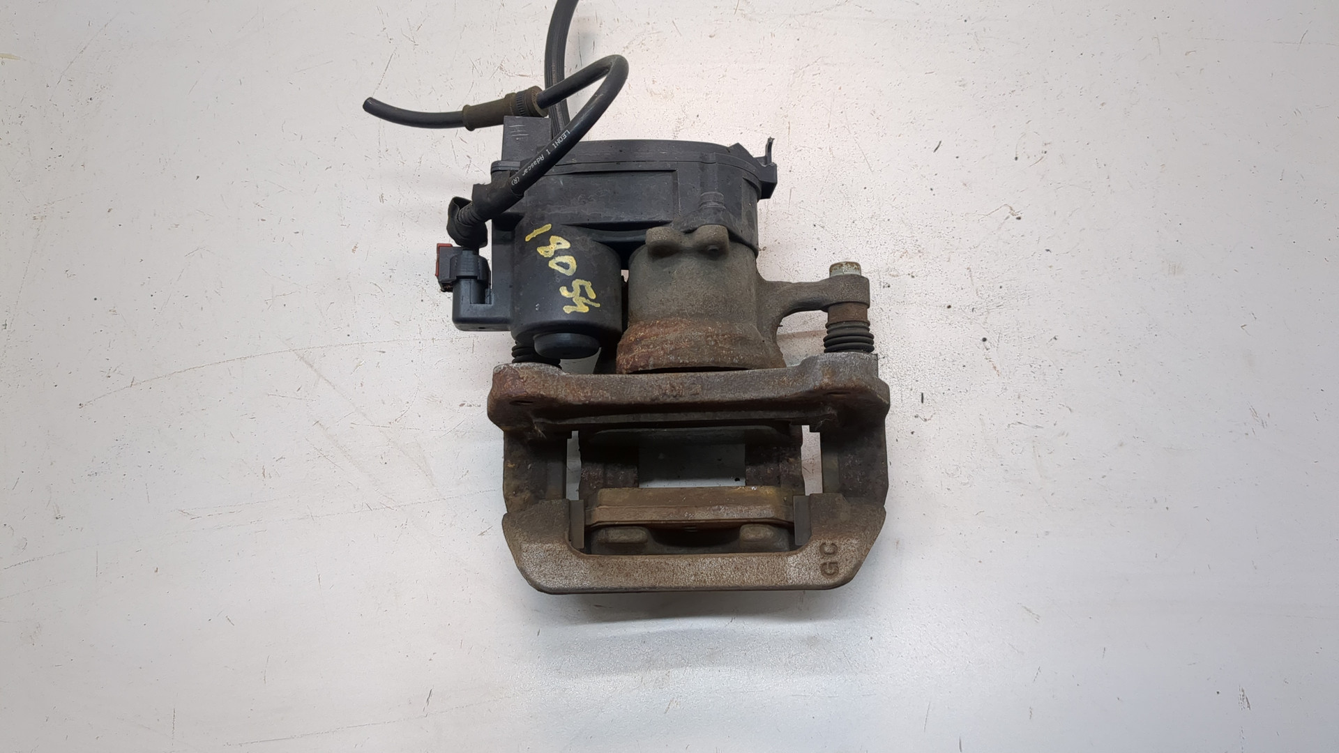 Суппорт задний левый