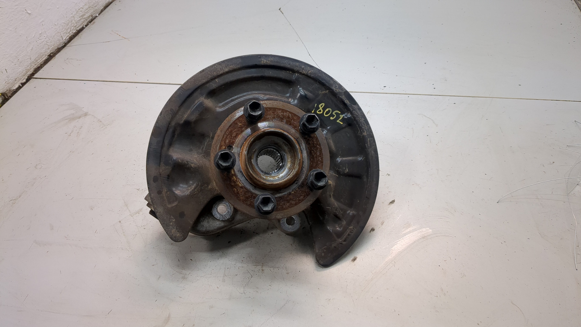 Кулак поворотный задний левый