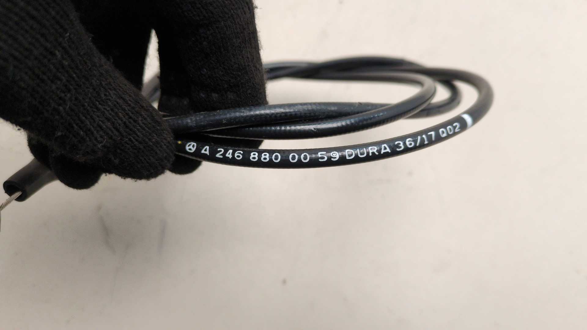 Трос открывания капота