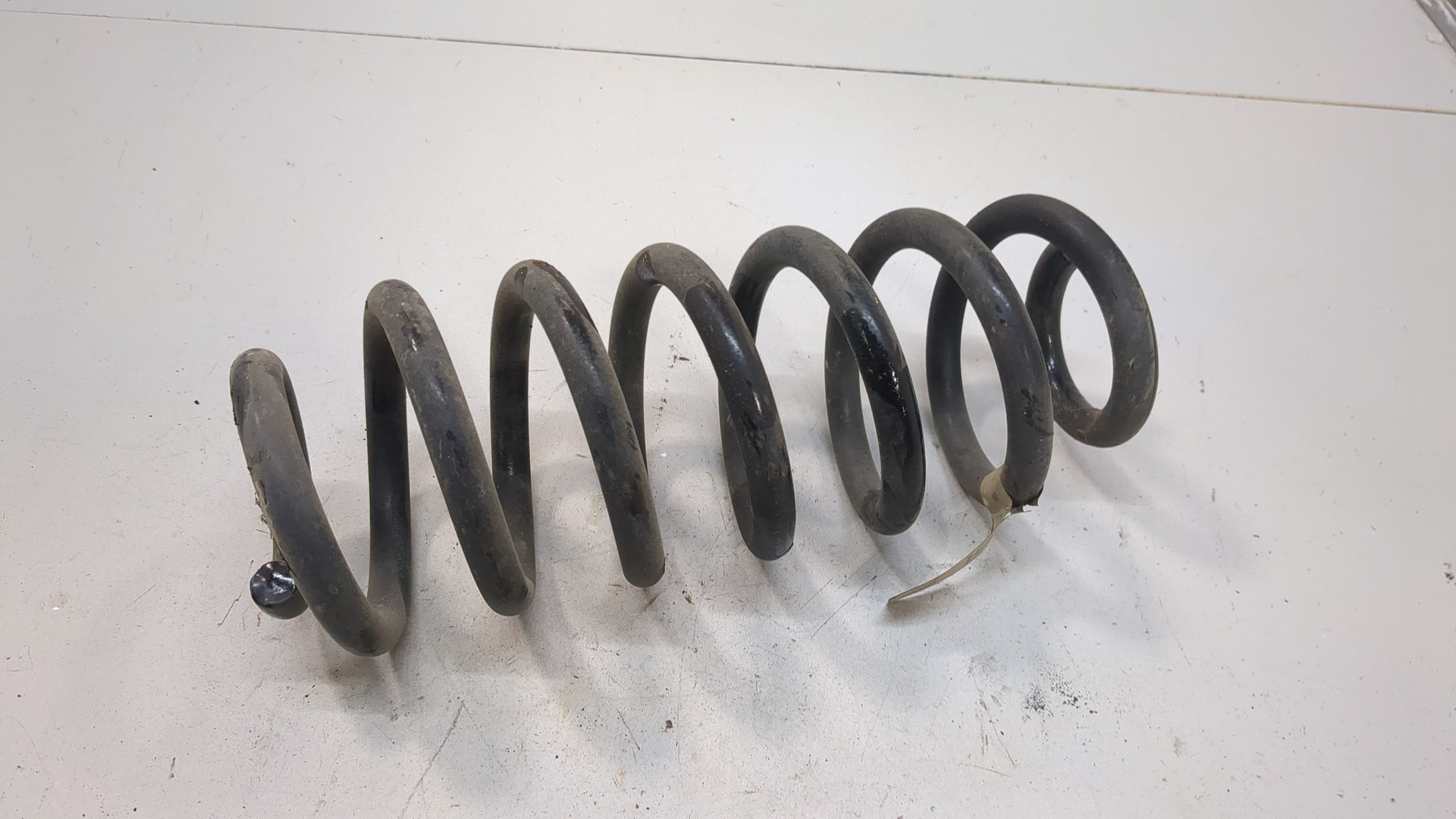 Пружина задняя