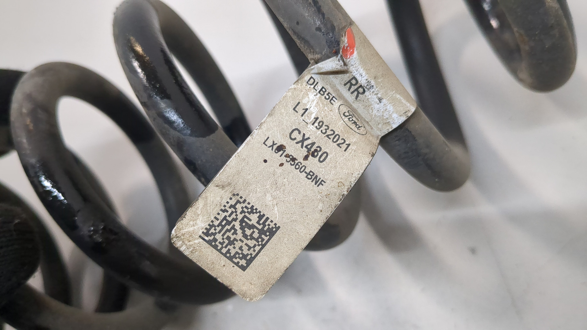 Пружина задняя