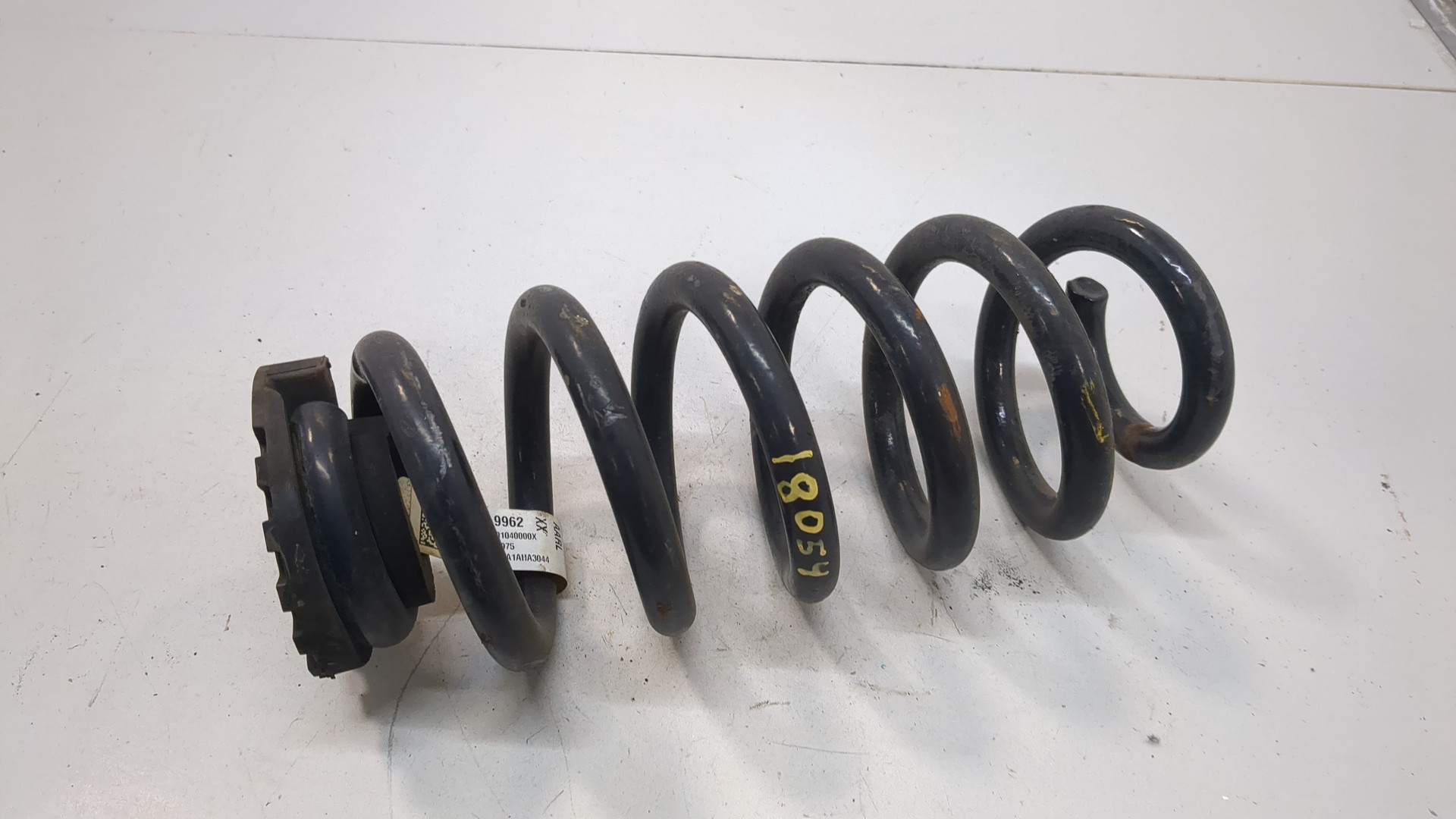 Пружина задняя