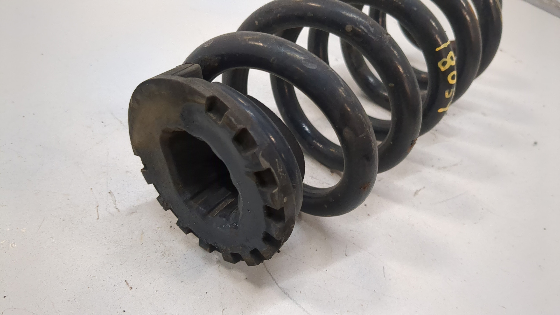 Пружина задняя