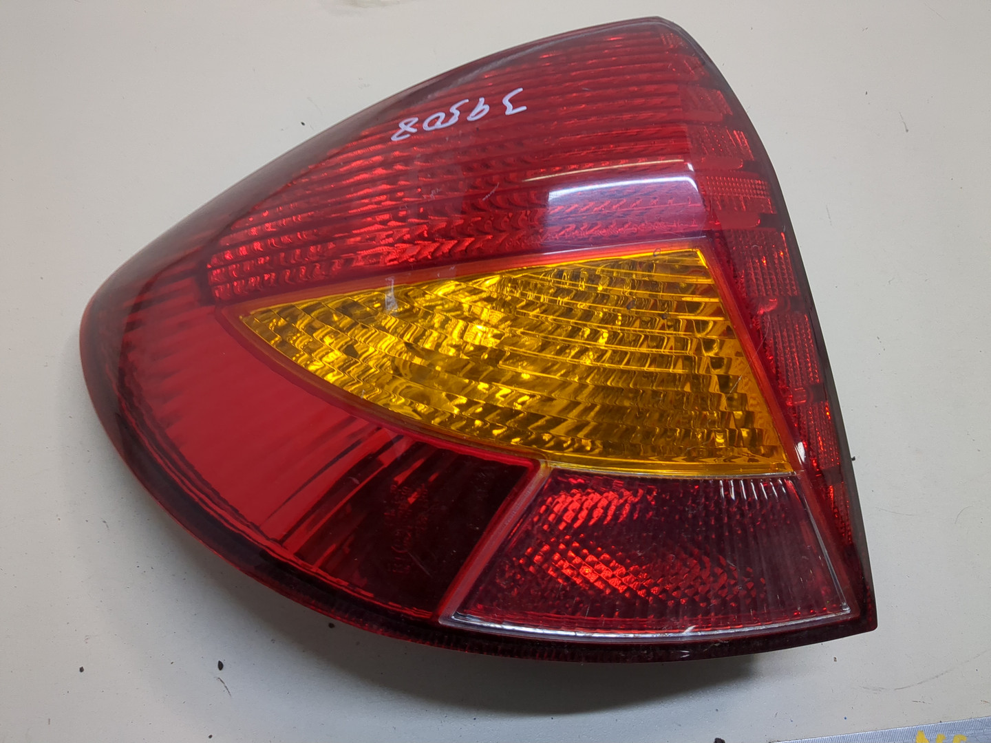 Фонарь задний левый