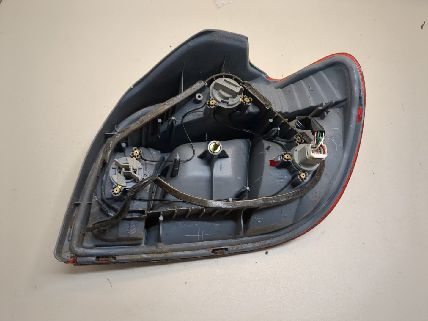 Фонарь задний левый