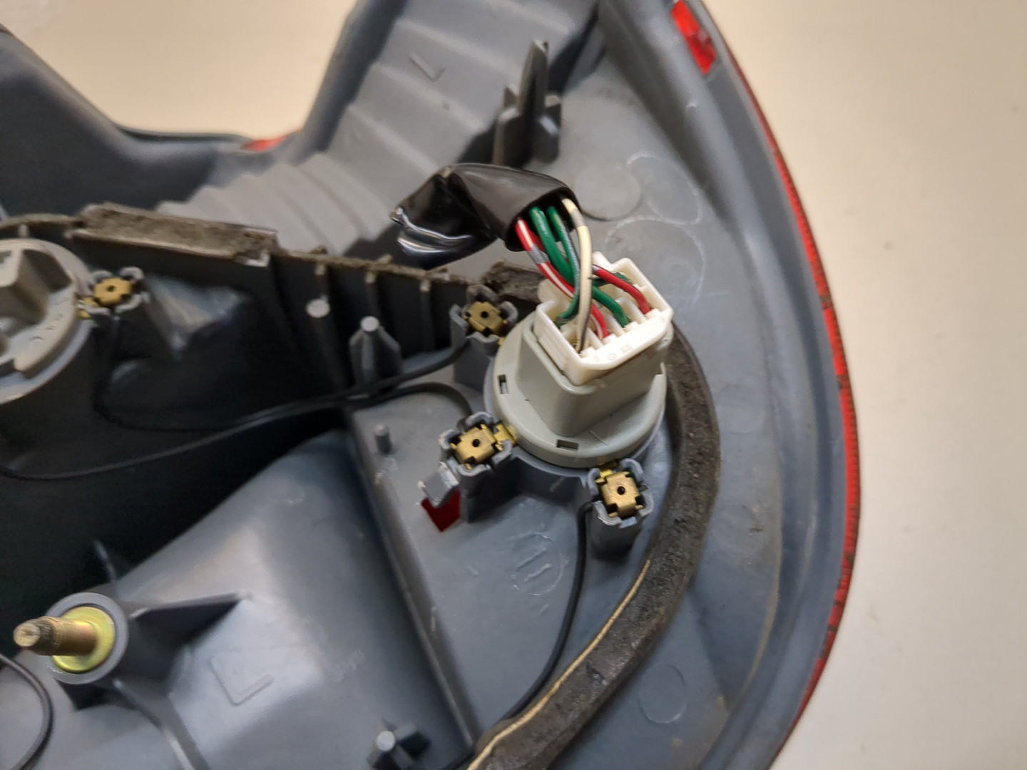 Фонарь задний левый