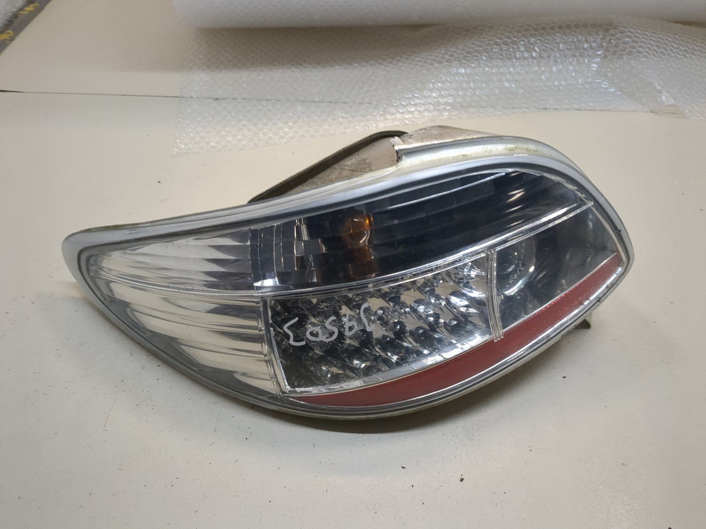 Фонарь задний левый