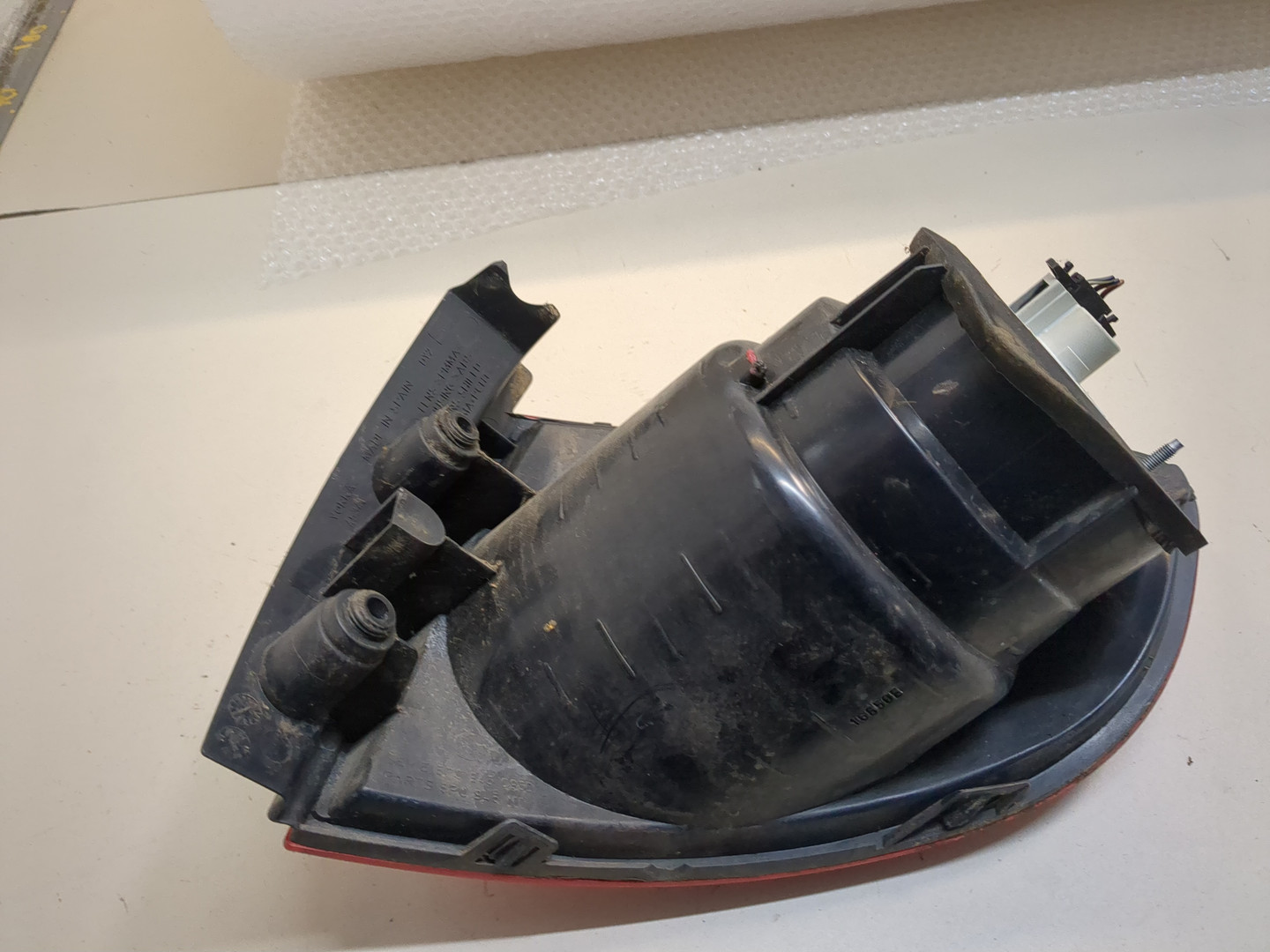 Фонарь задний левый