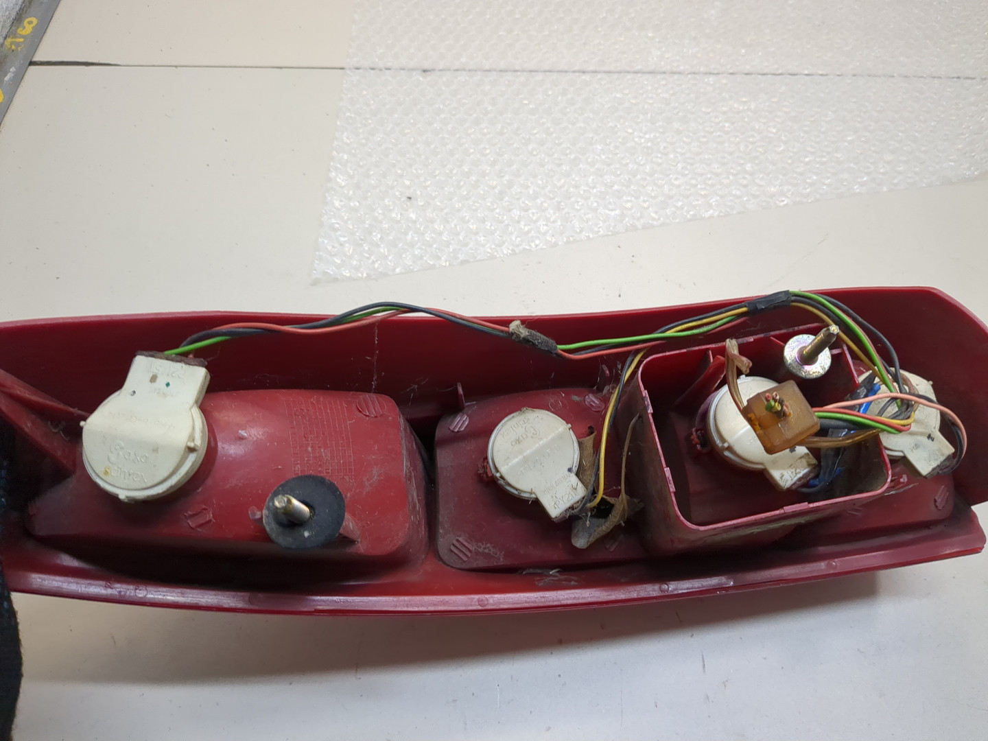 Фонарь задний левый