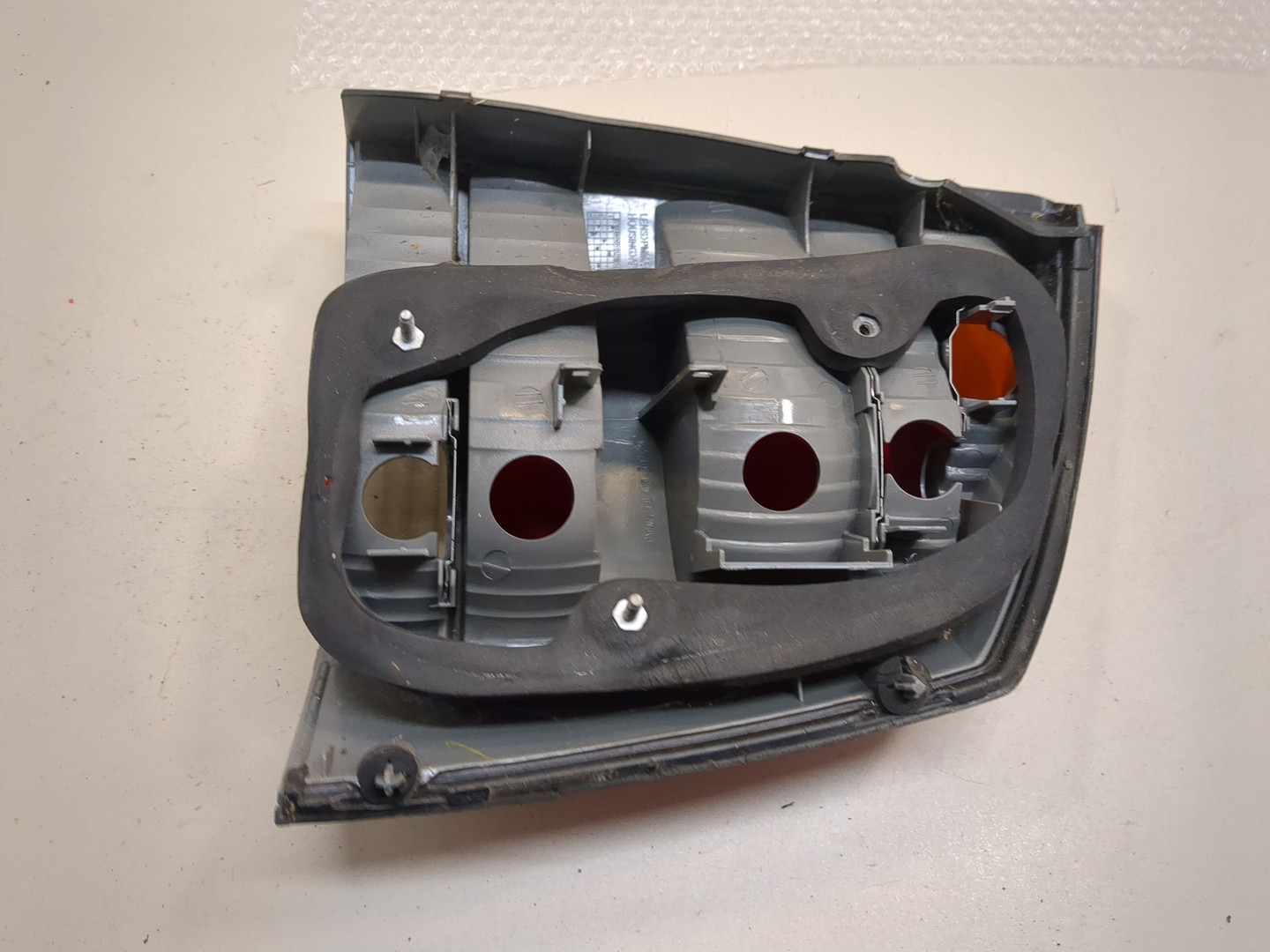 Фонарь задний левый