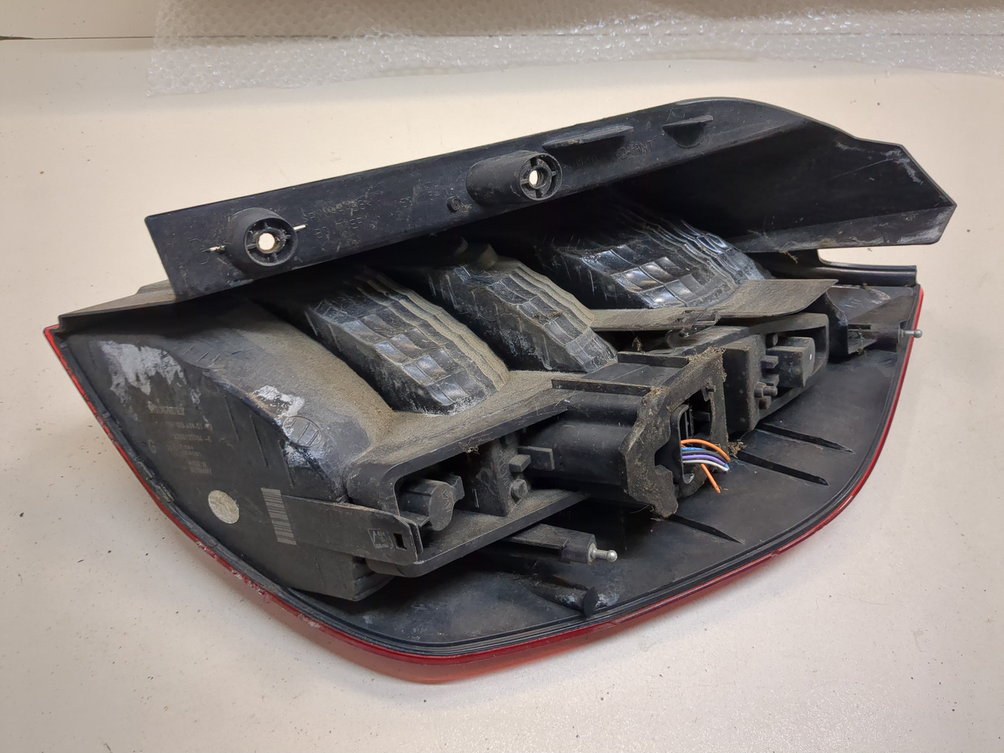 Фонарь задний левый