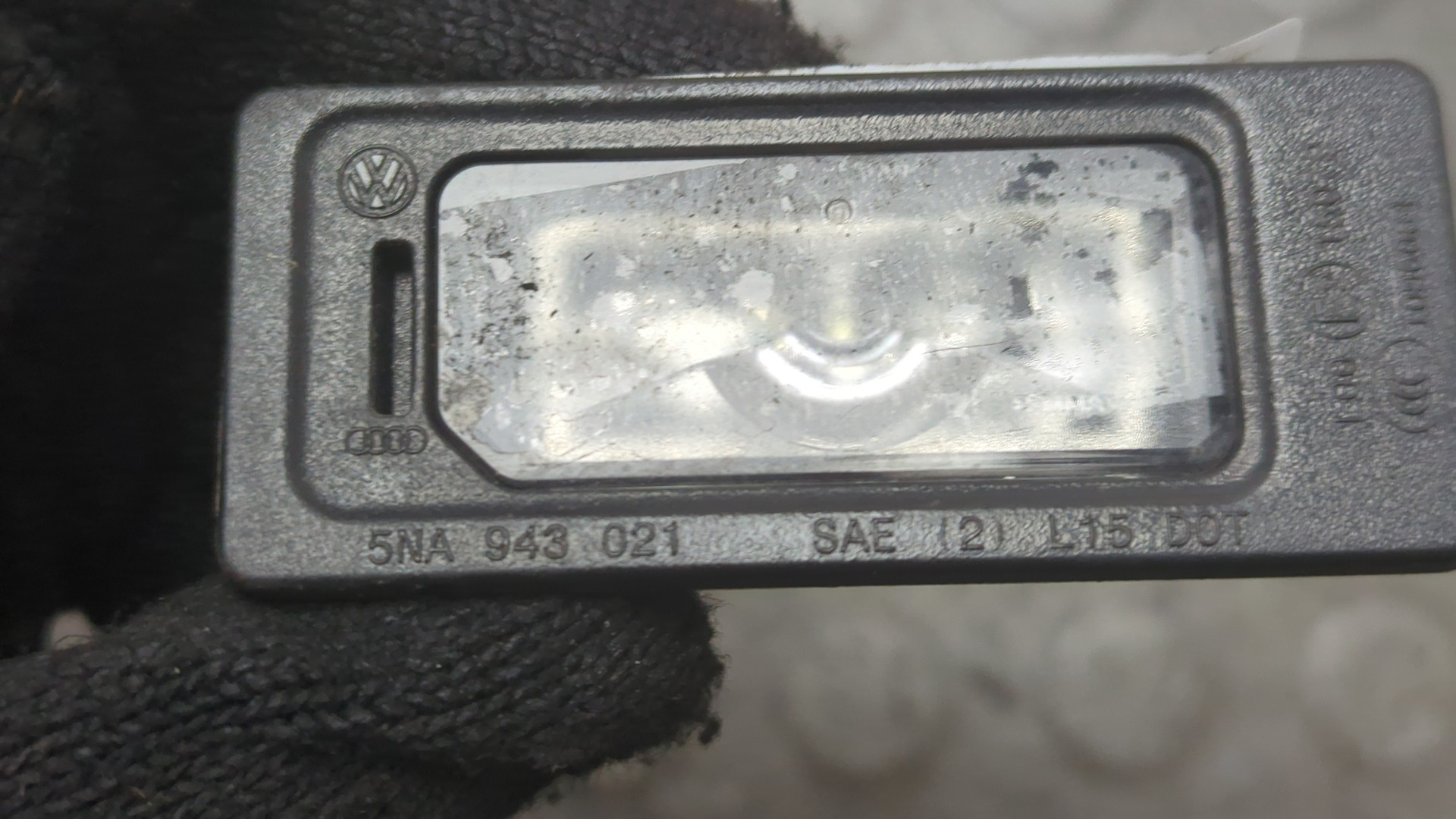 Фонарь подсветки номера