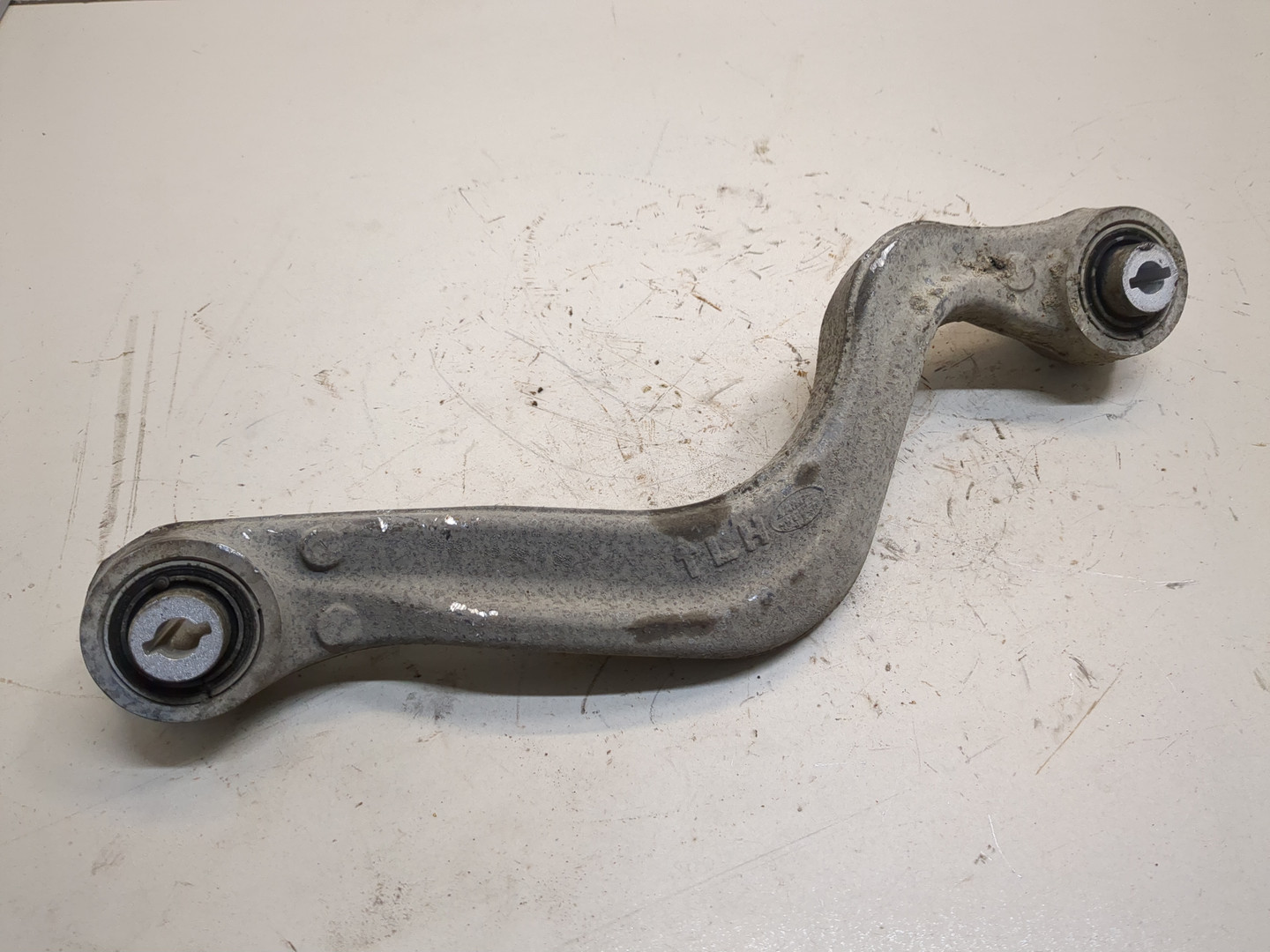 Рычаг задний левый