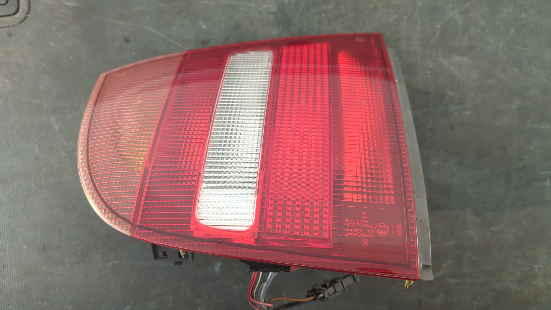 Фонарь задний левый