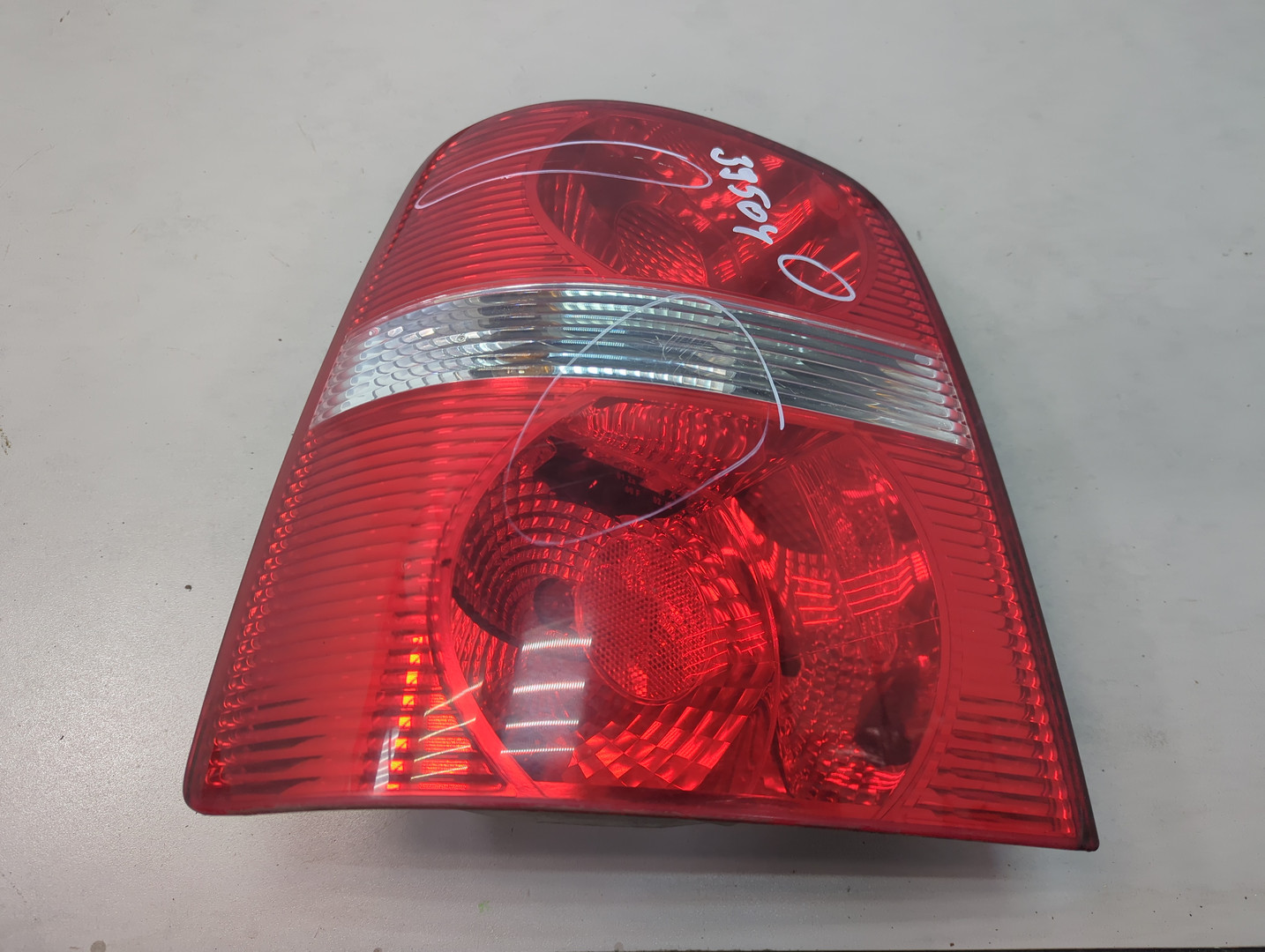 Фонарь задний левый