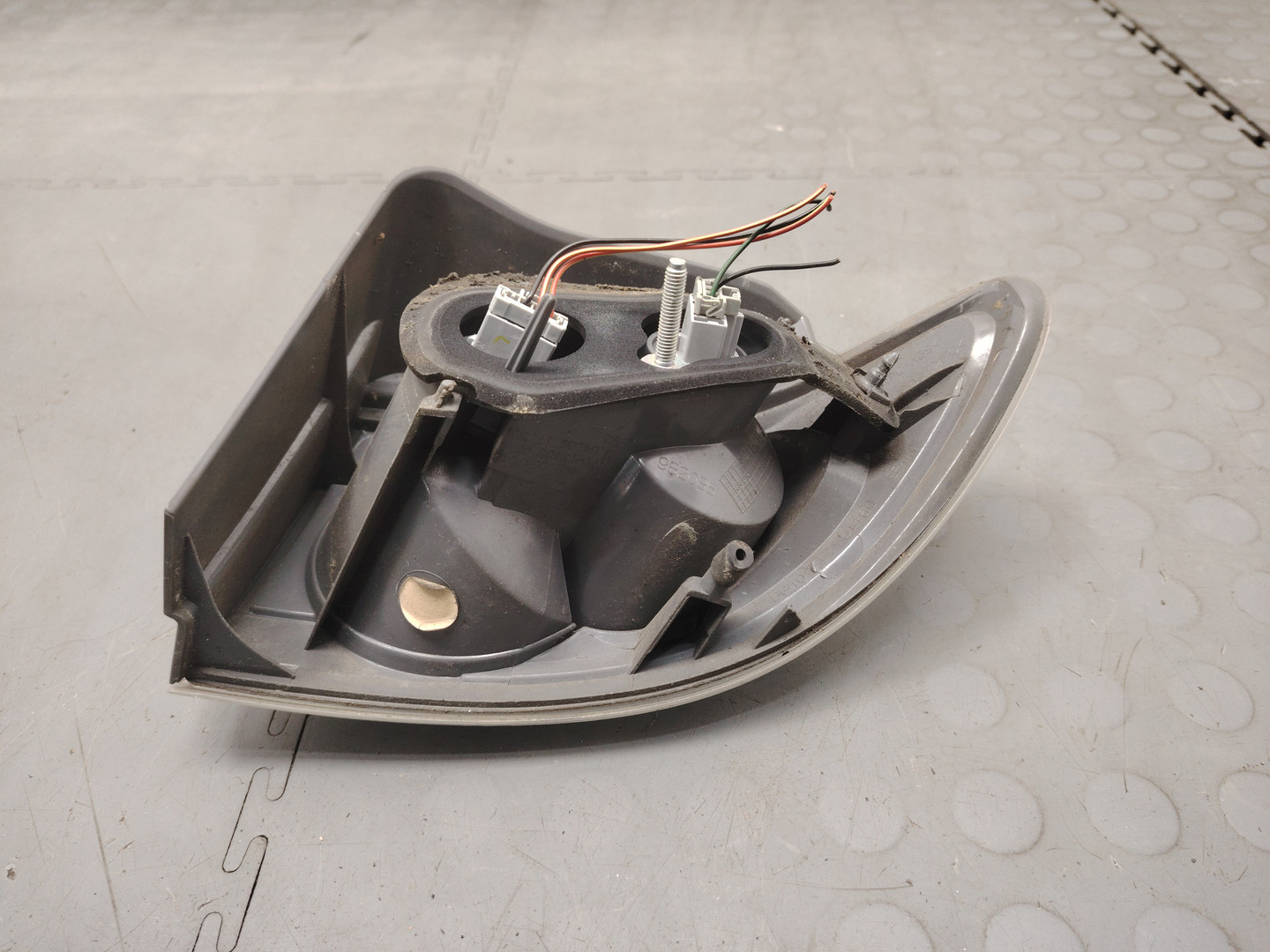 Фонарь задний левый