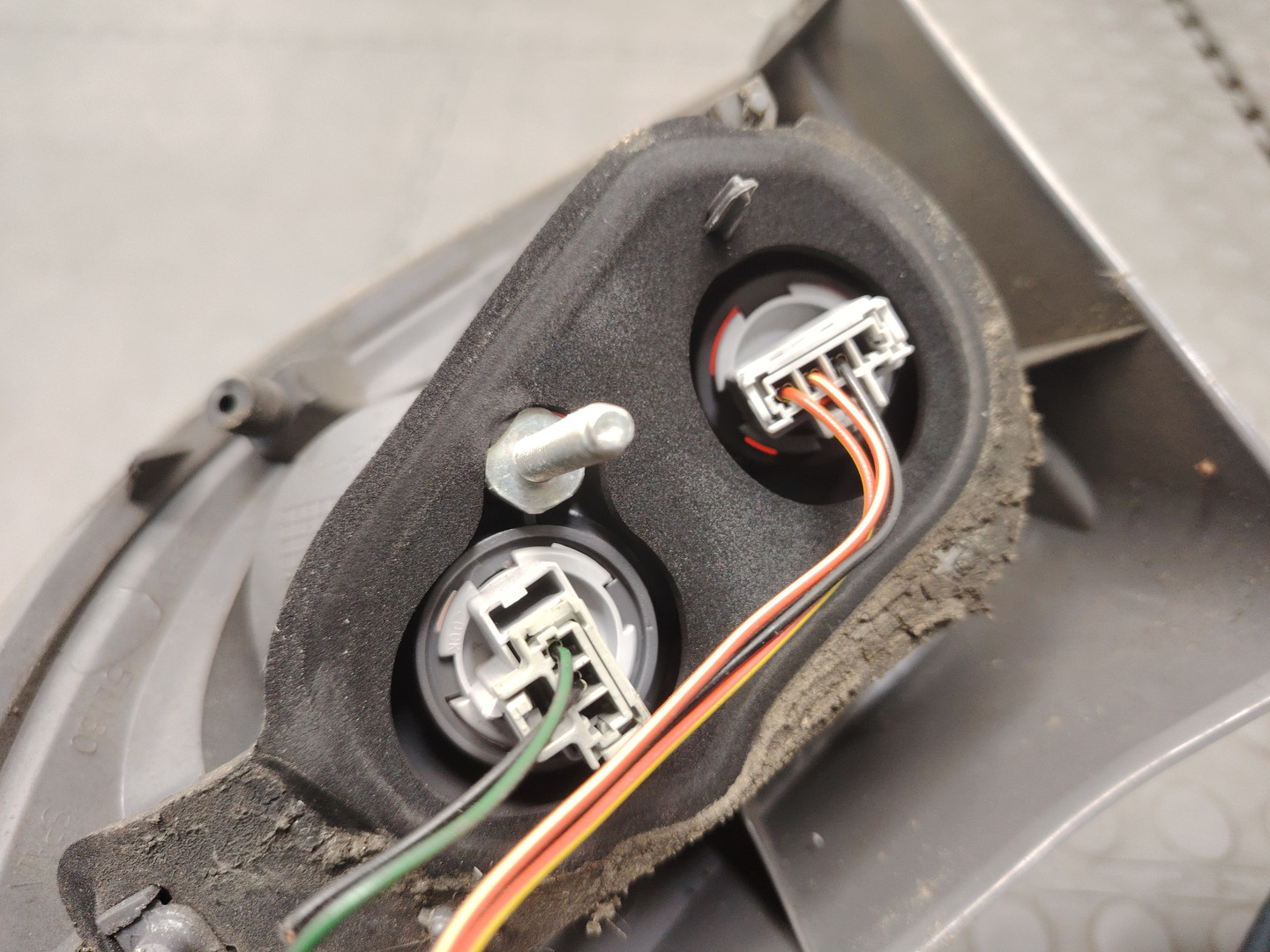 Фонарь задний левый