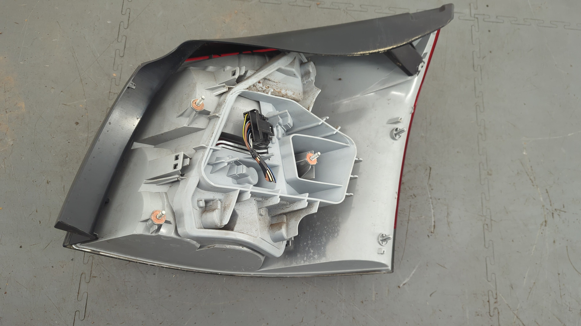 Фонарь задний левый