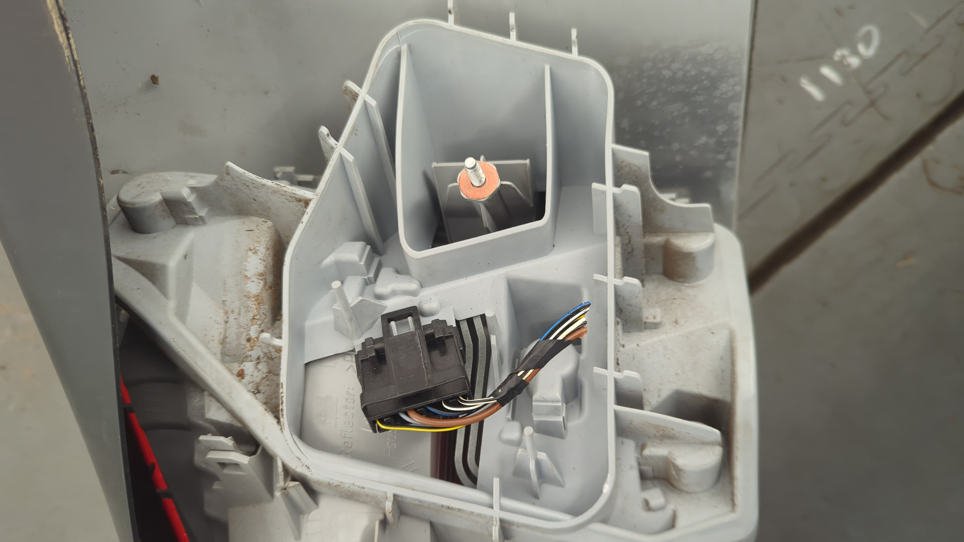 Фонарь задний левый