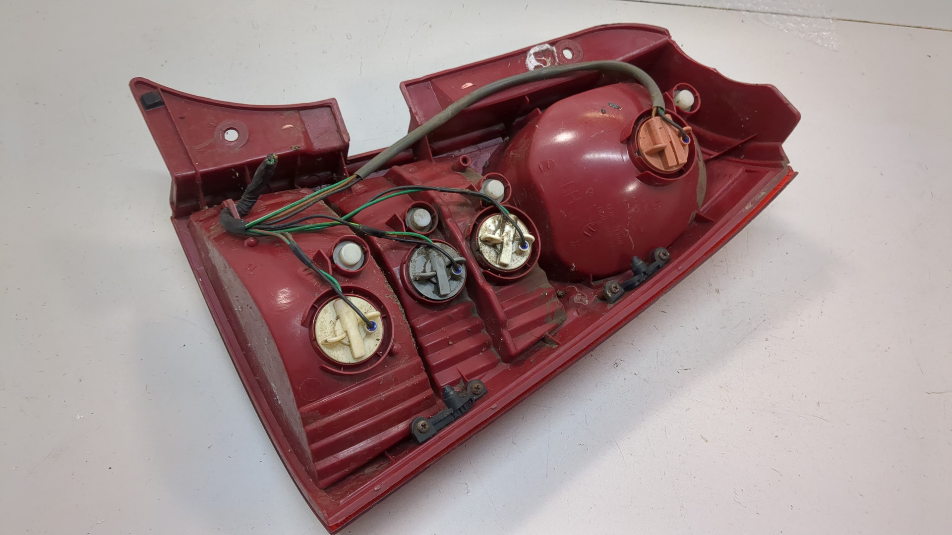 Фонарь задний левый