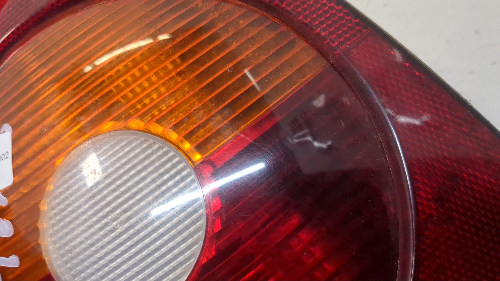 Фонарь задний левый