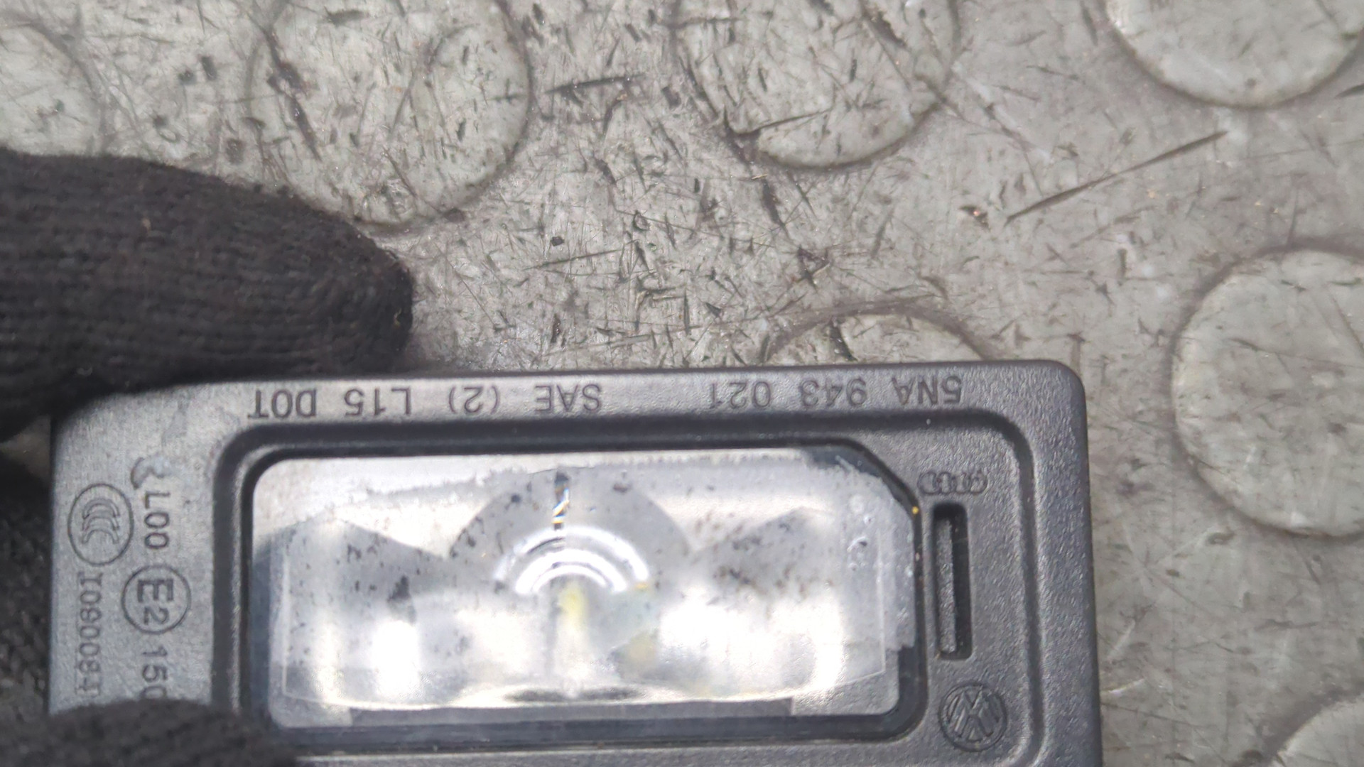 Фонарь подсветки номера