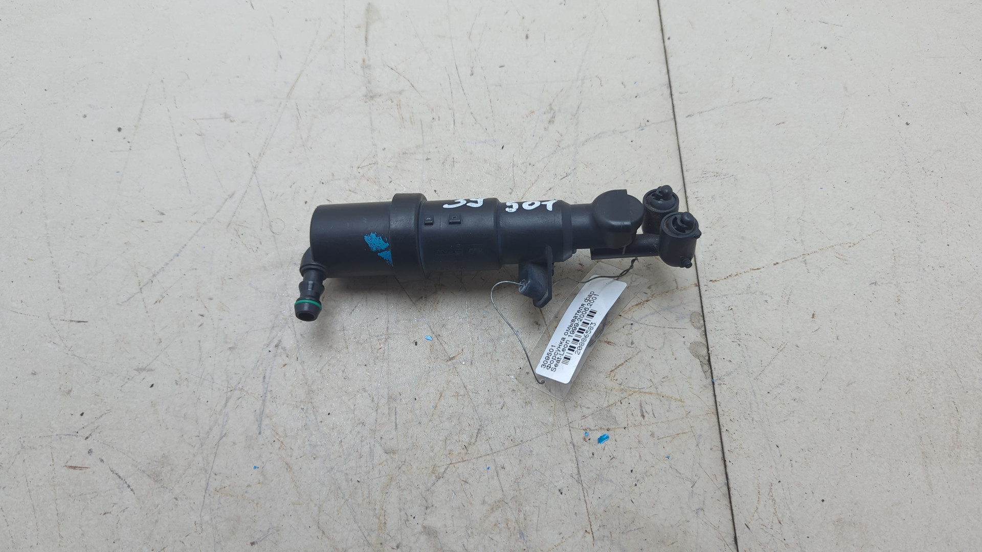 Форсунка омывателя фары