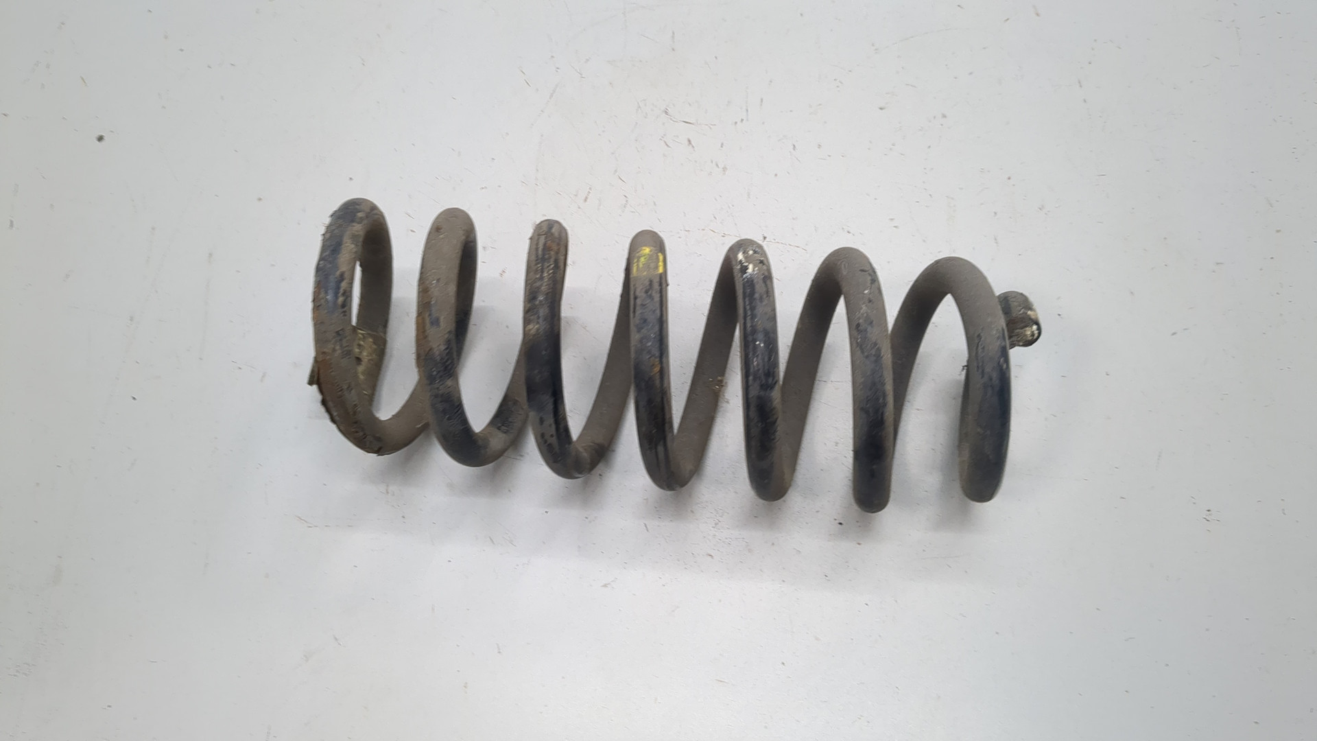 Пружина задняя