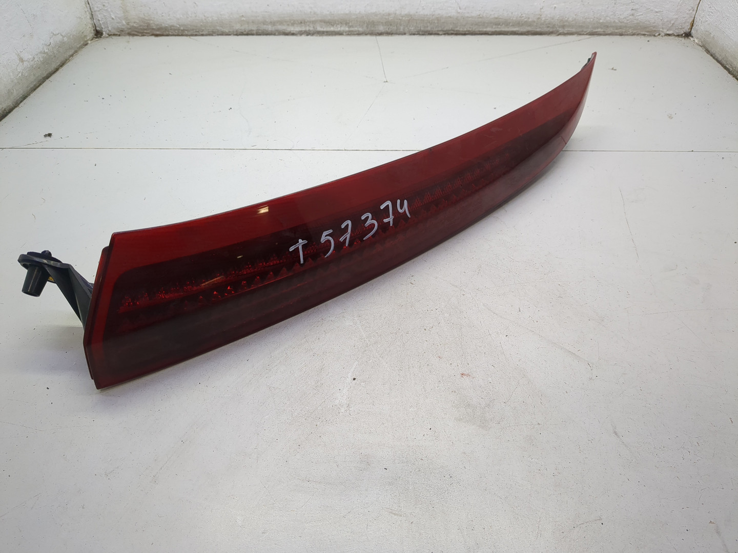 Отражатель в бампер задний левый