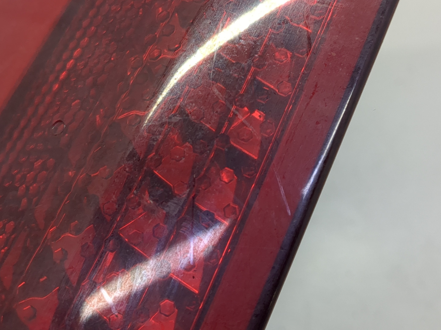 Отражатель в бампер задний левый