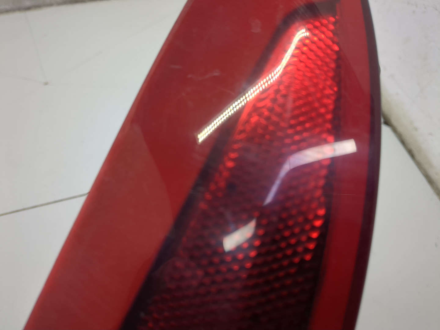 Отражатель в бампер задний левый