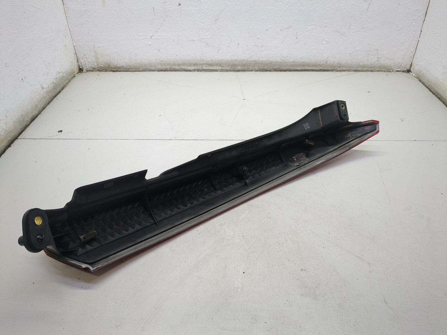 Отражатель в бампер задний левый