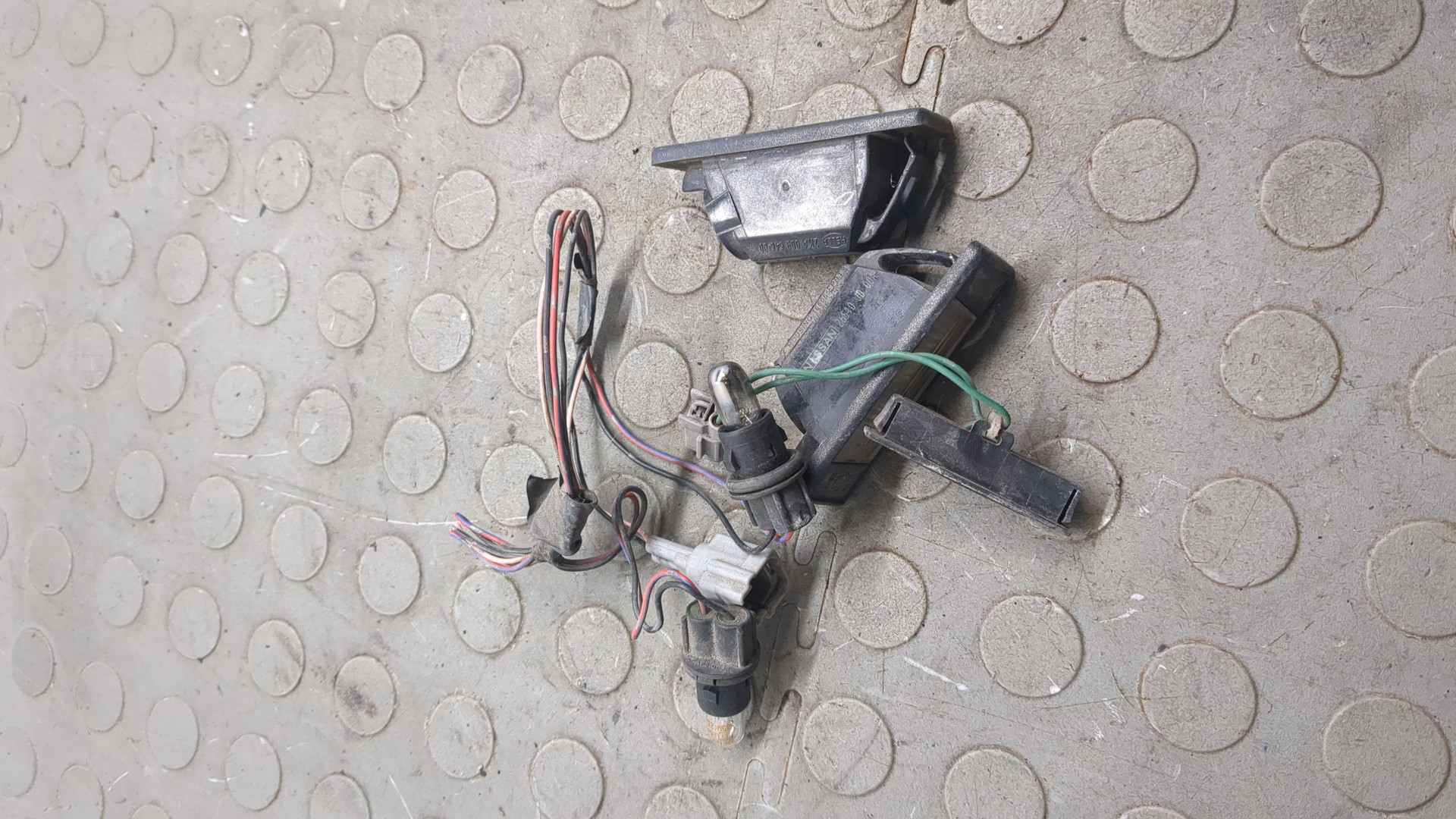 Фонарь подсветки номера