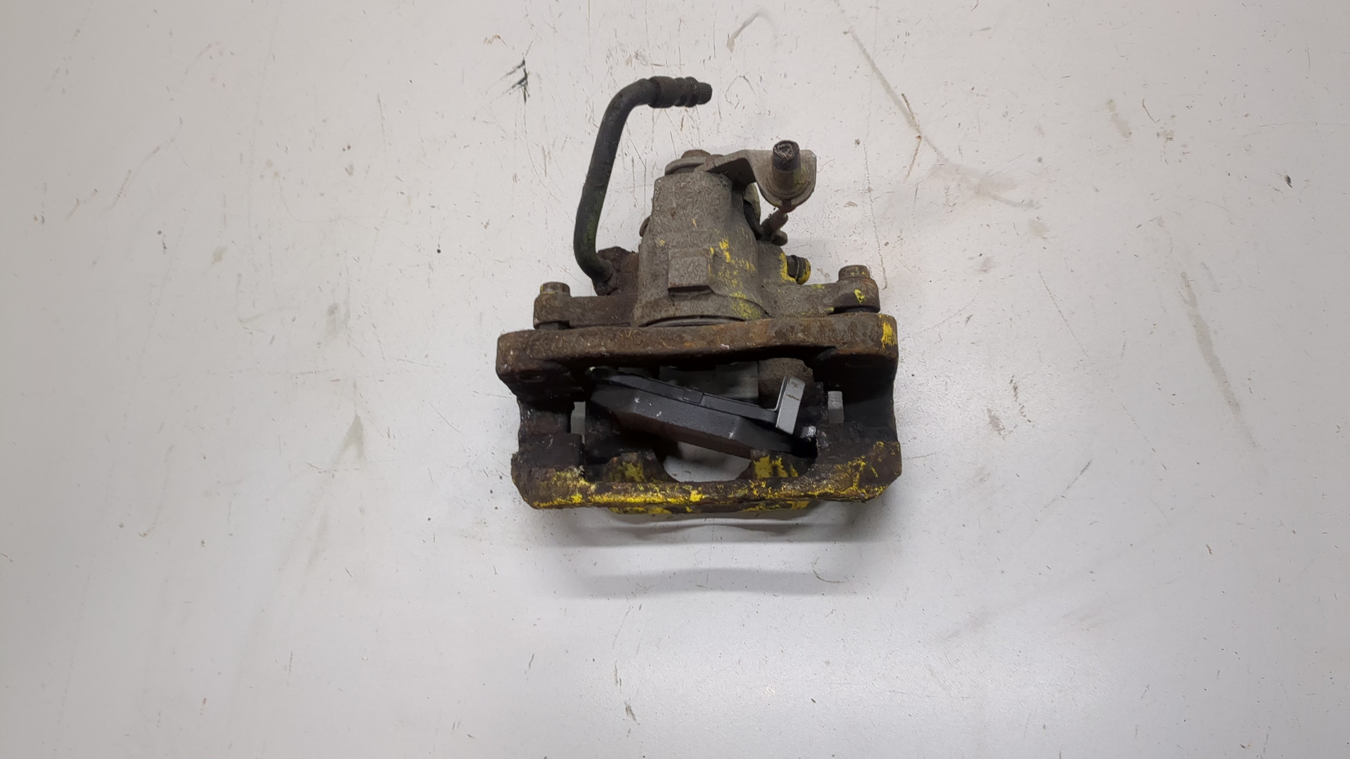 Суппорт задний левый