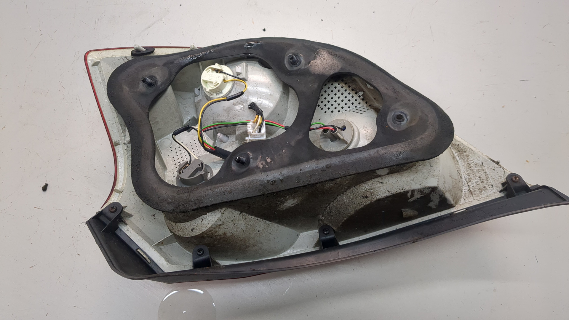 Фонарь задний левый