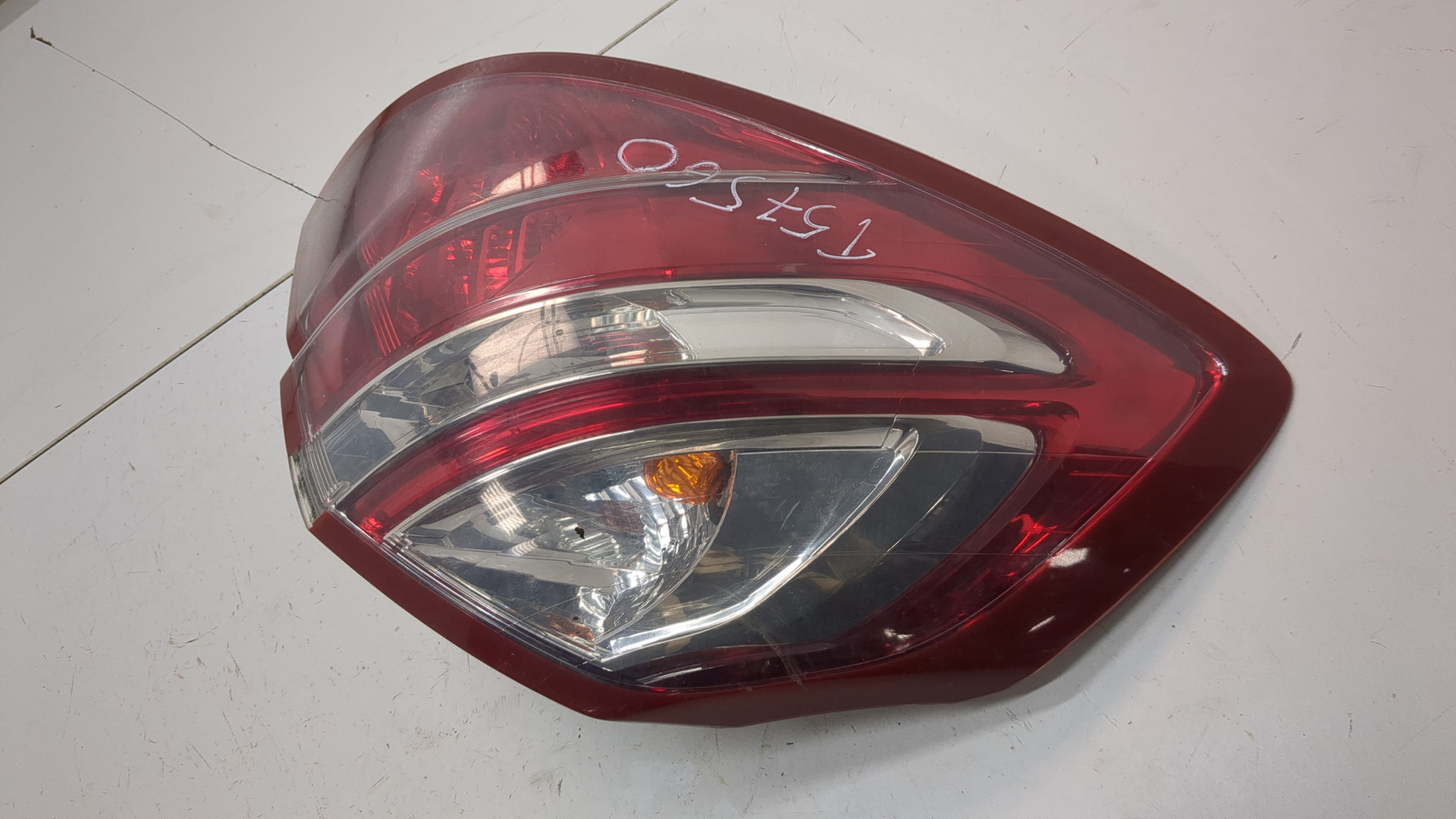 Фонарь задний левый