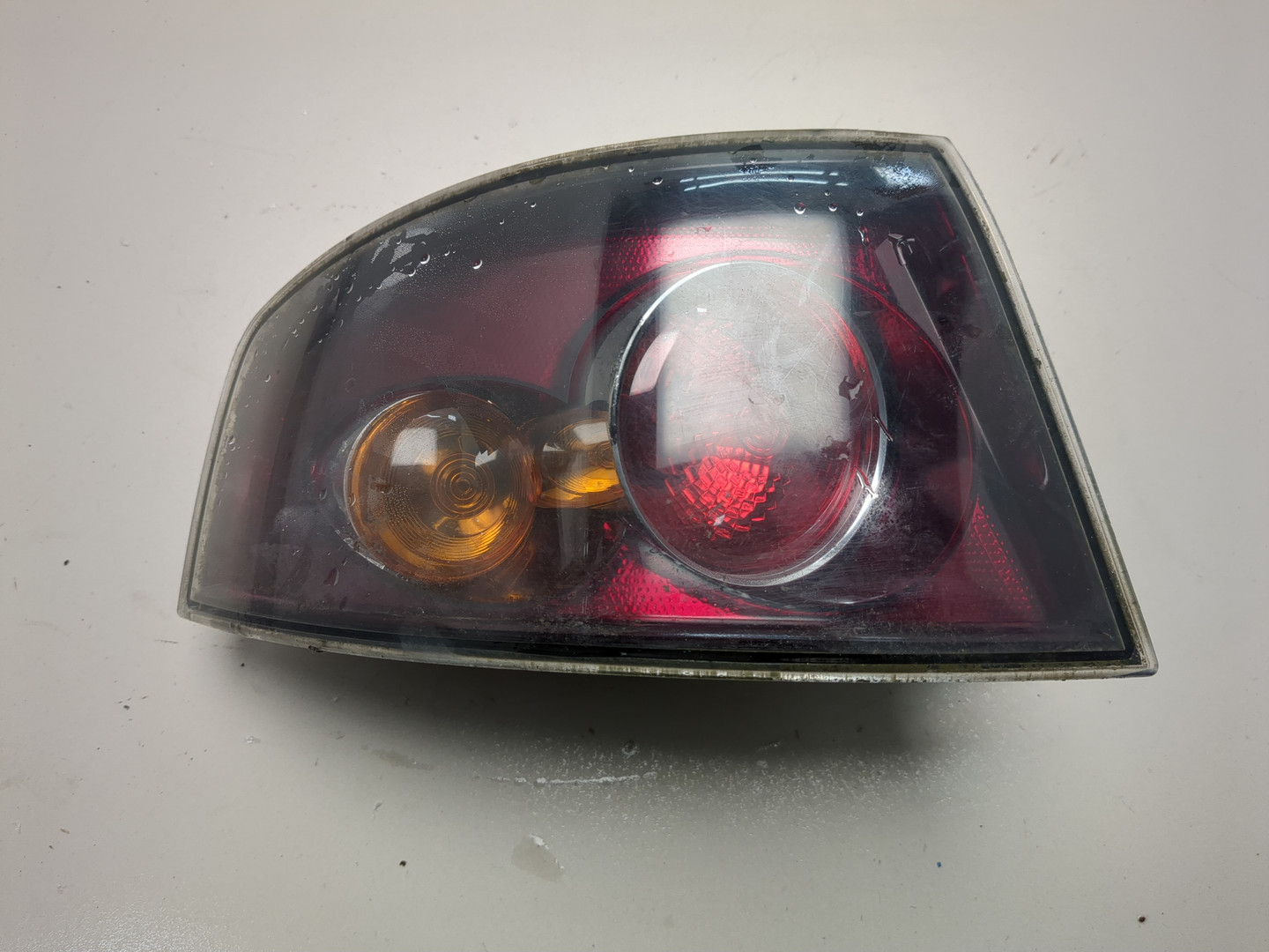 Фонарь задний левый