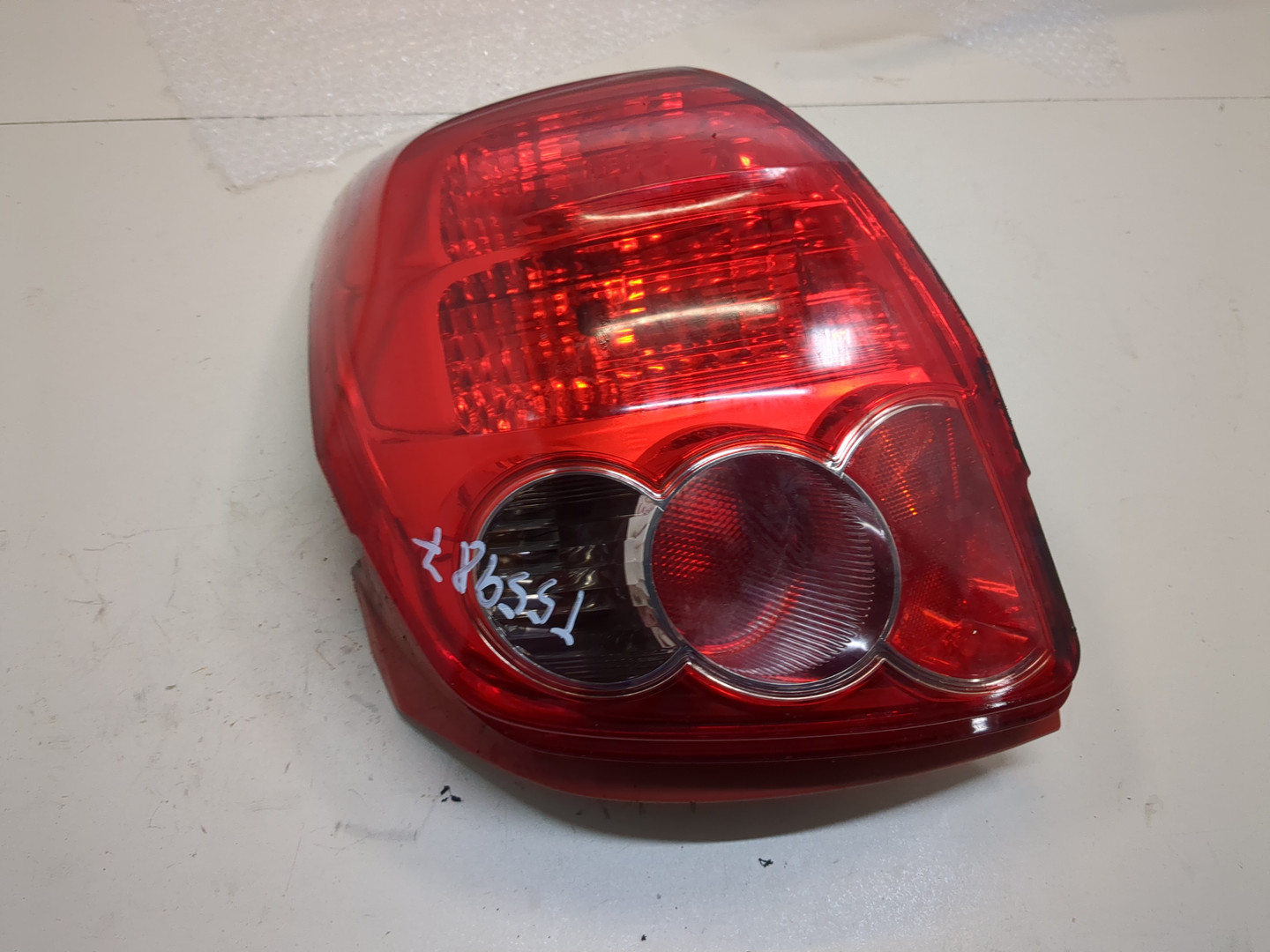 Фонарь задний левый