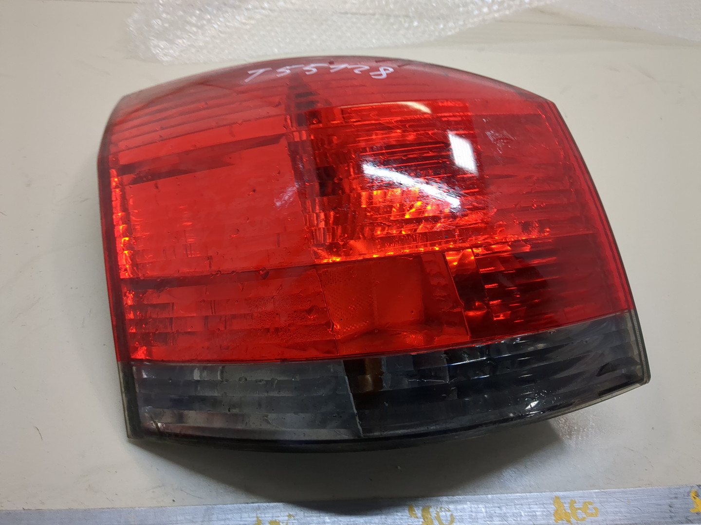 Фонарь задний левый