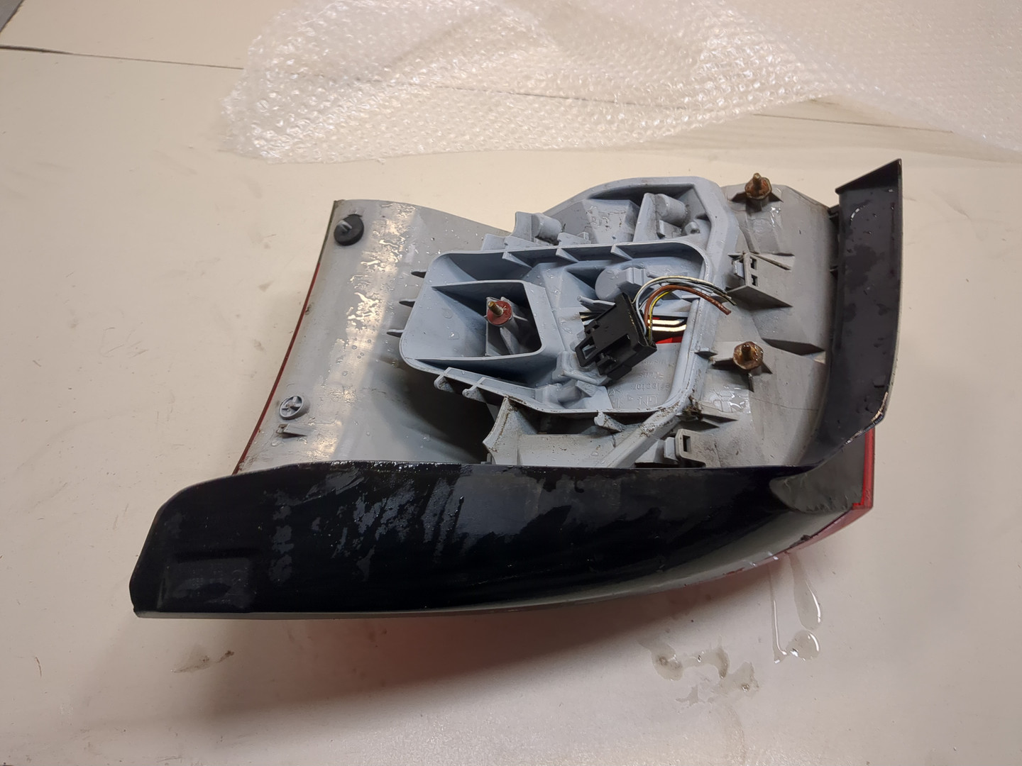 Фонарь задний левый