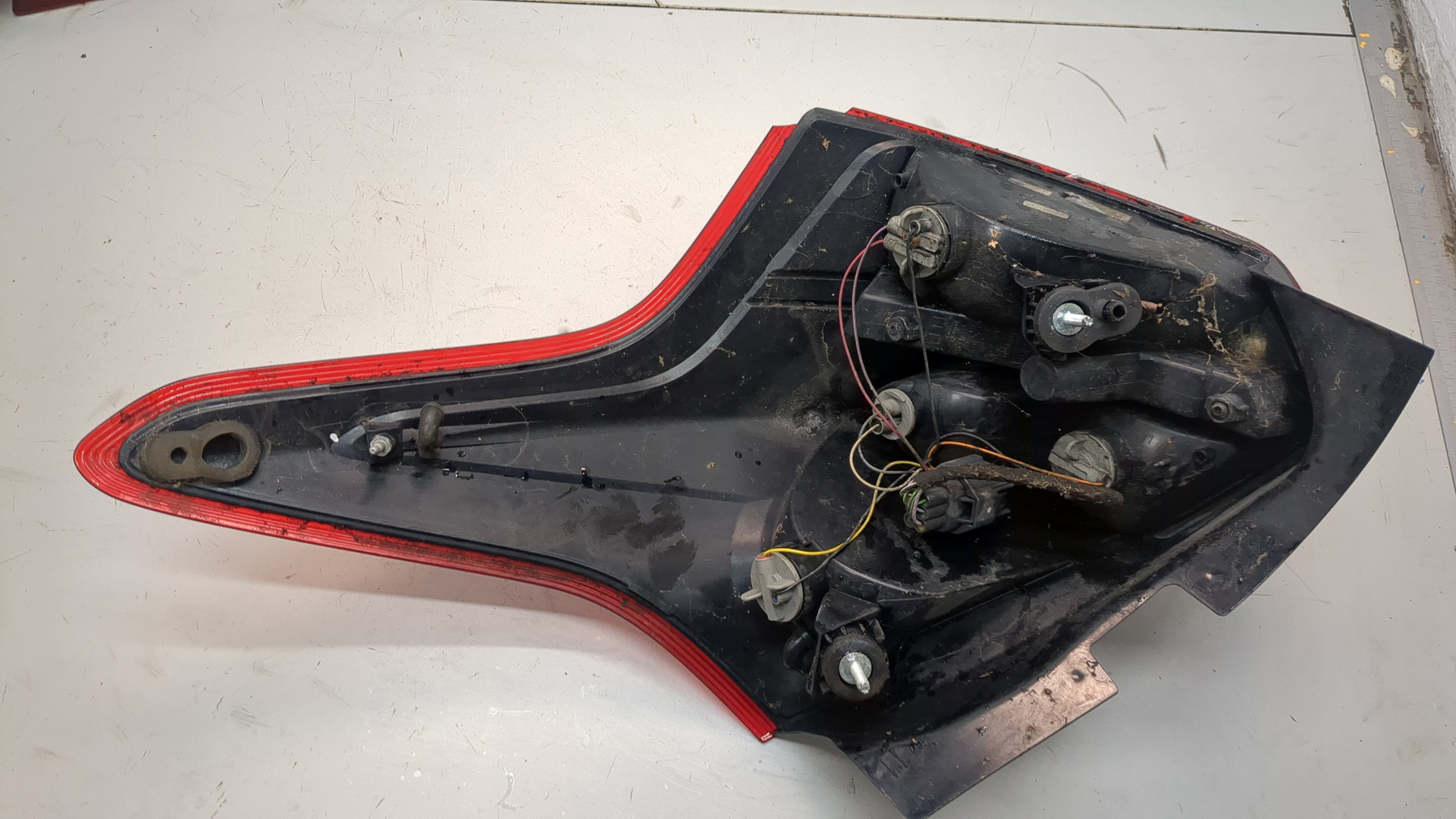 Фонарь задний левый