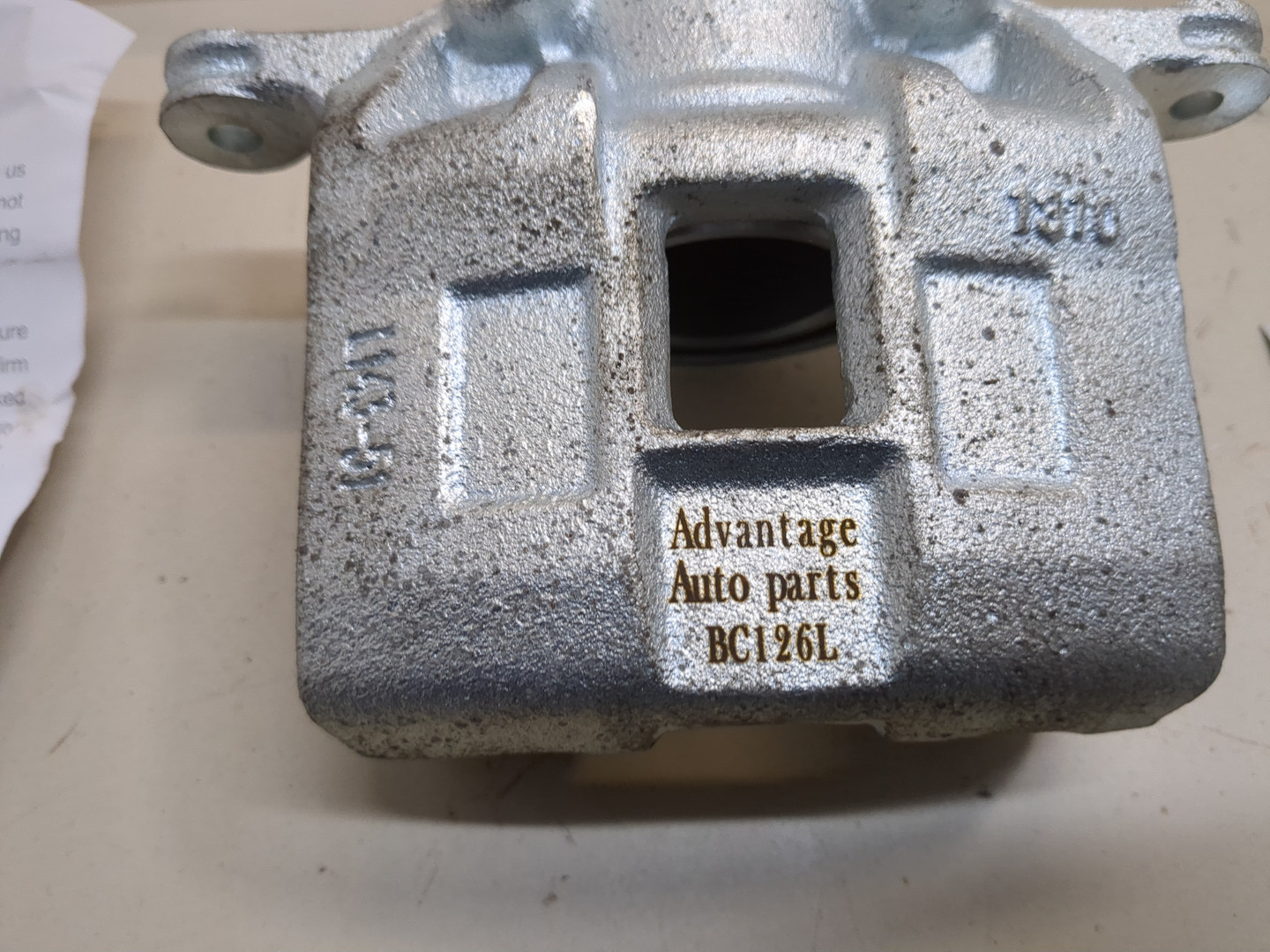 Суппорт передний левый