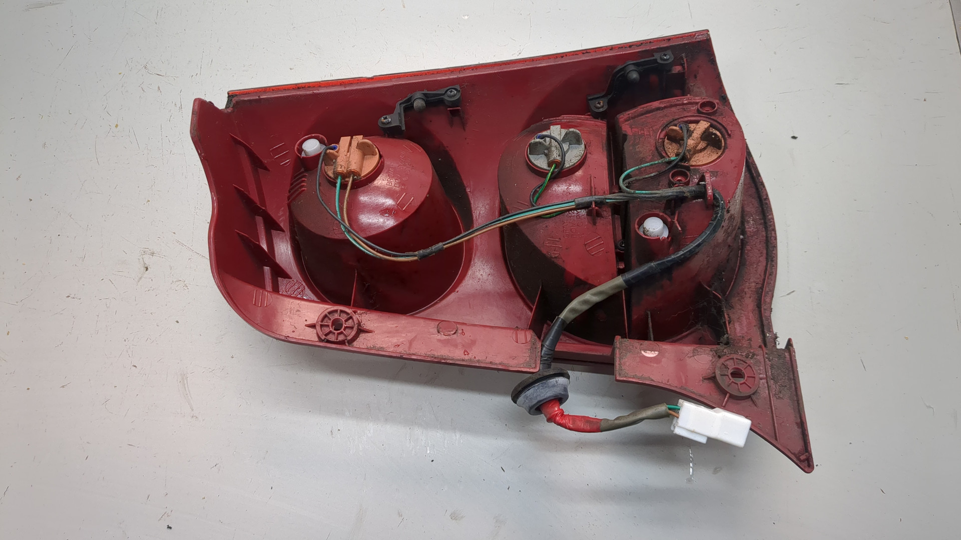 Фонарь задний левый