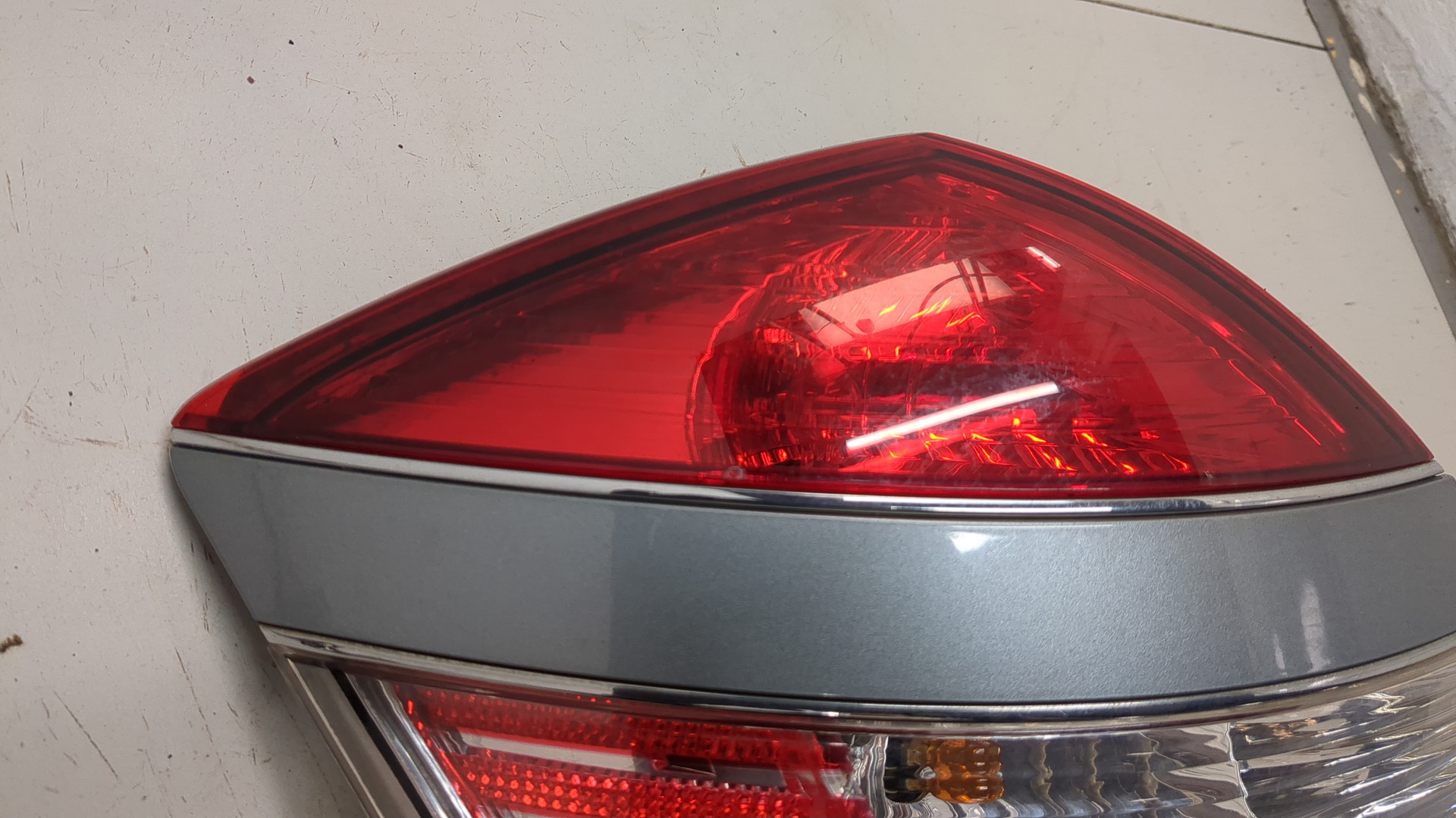 Фонарь задний левый